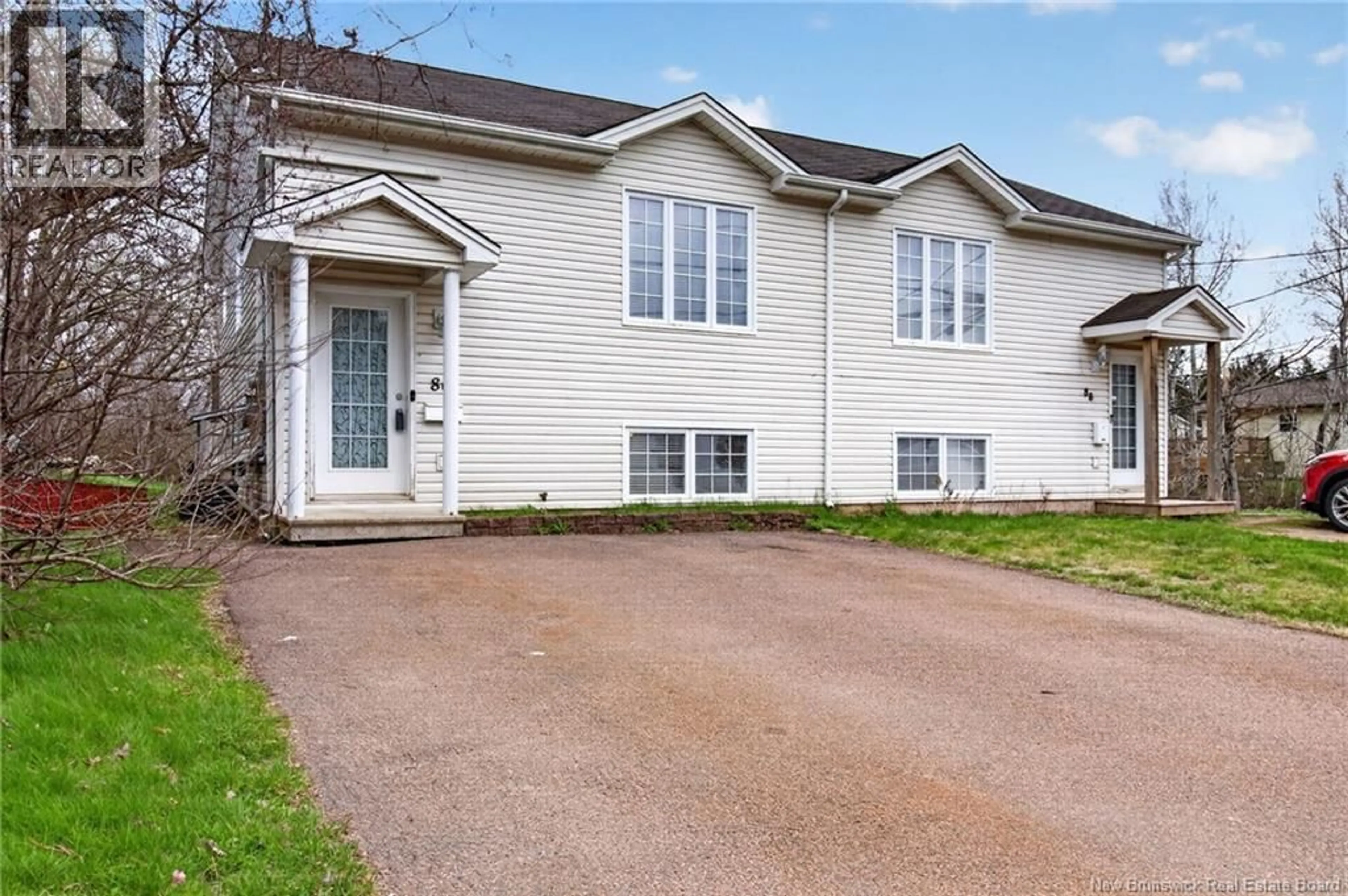 Home with vinyl exterior material, street for 86 LORETTE STREET, Dieppe New Brunswick E1A2E9
