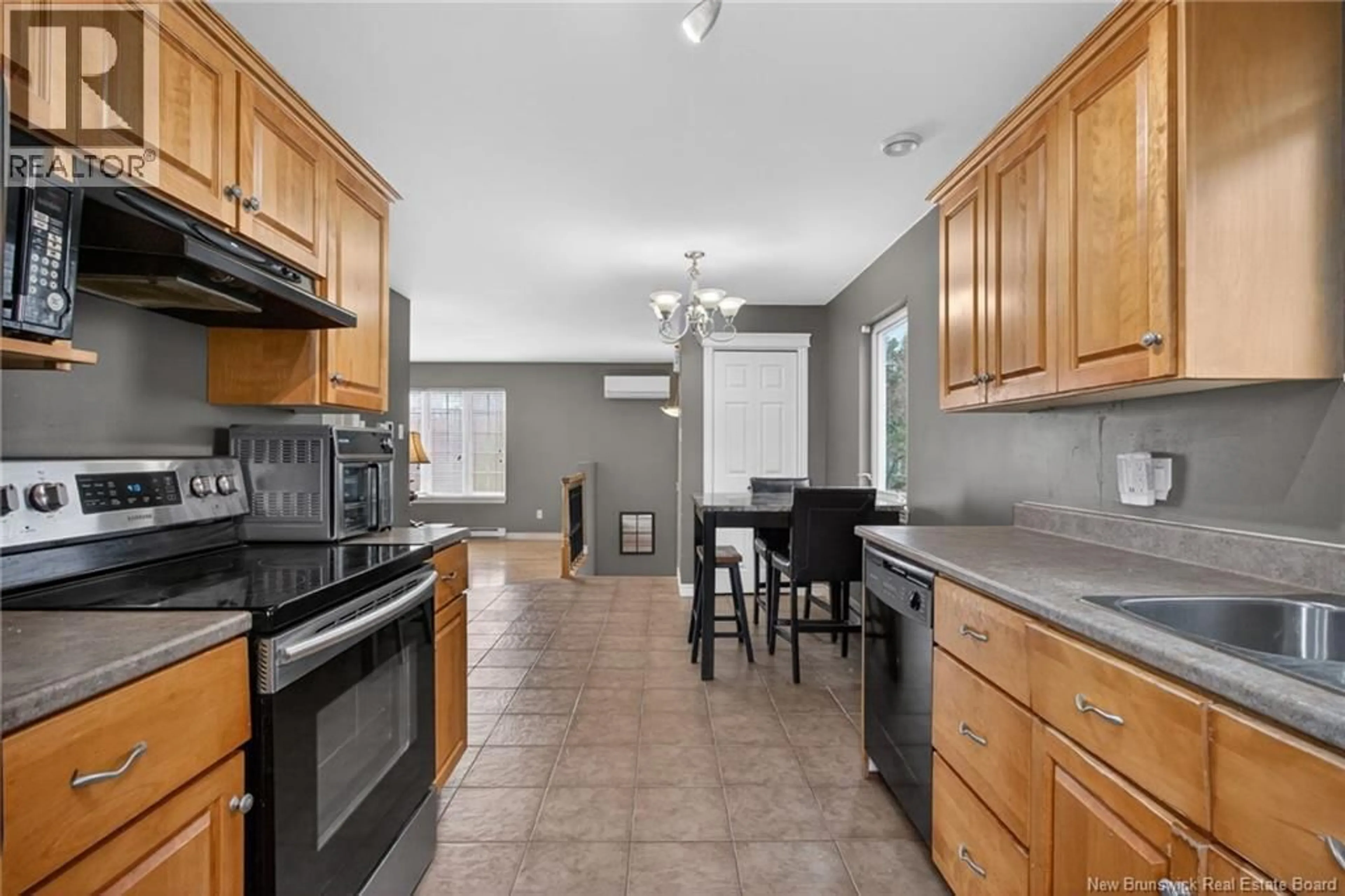 Open concept kitchen, ceramic/tile floor for 86 LORETTE STREET, Dieppe New Brunswick E1A2E9