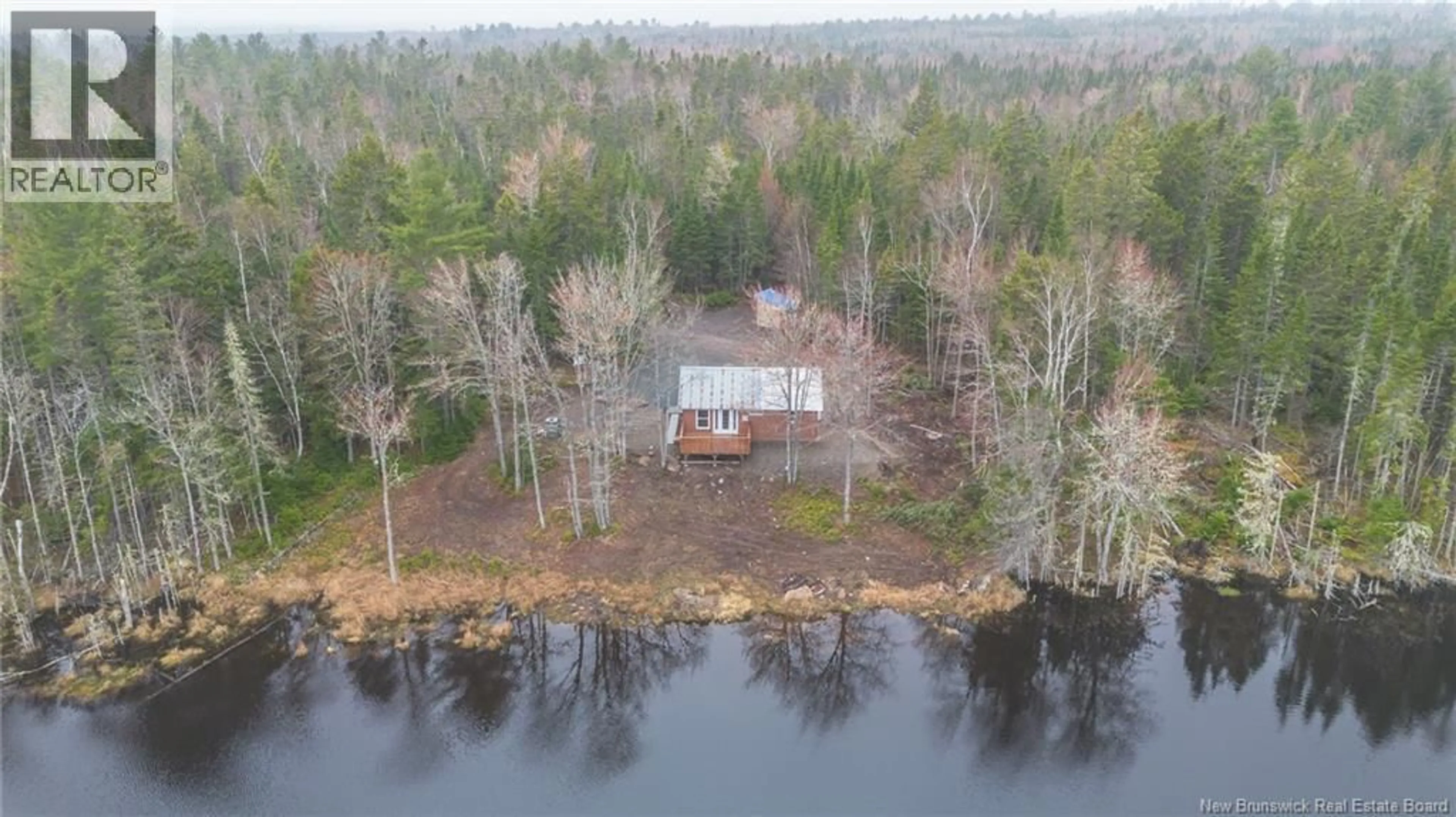 A pic from outside/outdoor area/front of a property/back of a property/a pic from drone, water/lake/river/ocean view for 1025A 10 ROUTE, Noonan New Brunswick O0O0O0