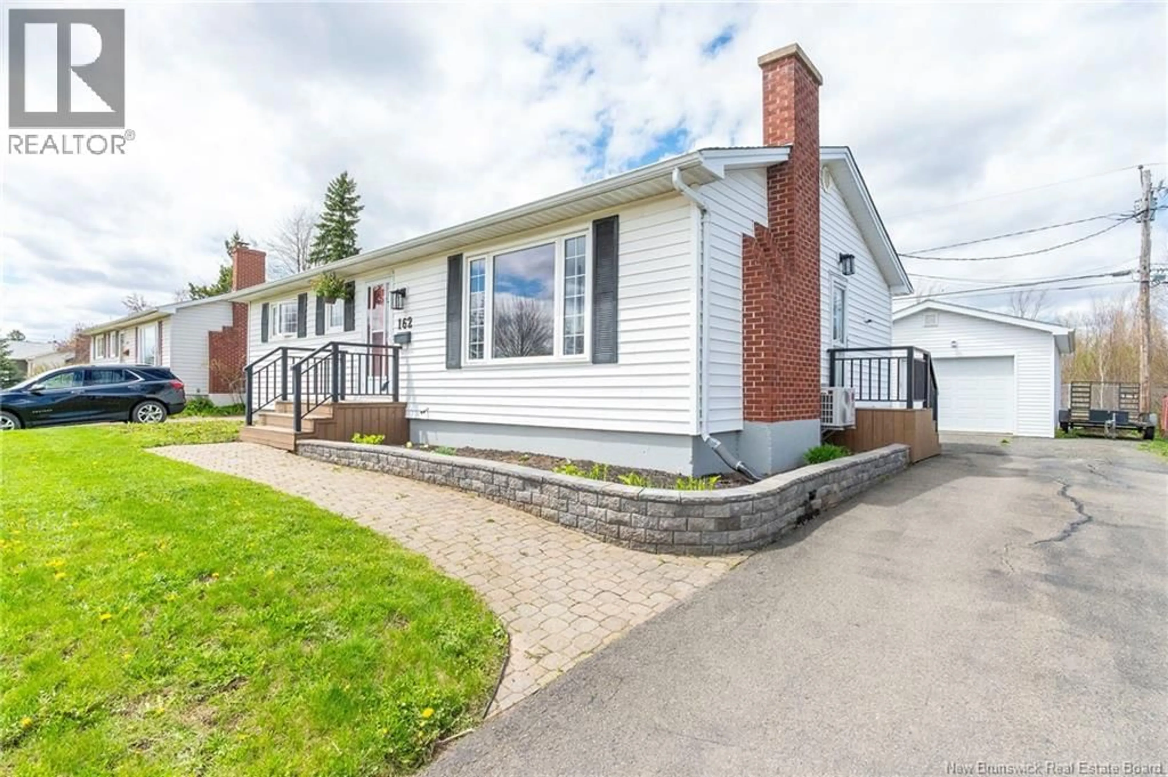 Home with vinyl exterior material, street for 162 QUEEN MARY ROAD, Moncton New Brunswick E1A3P5