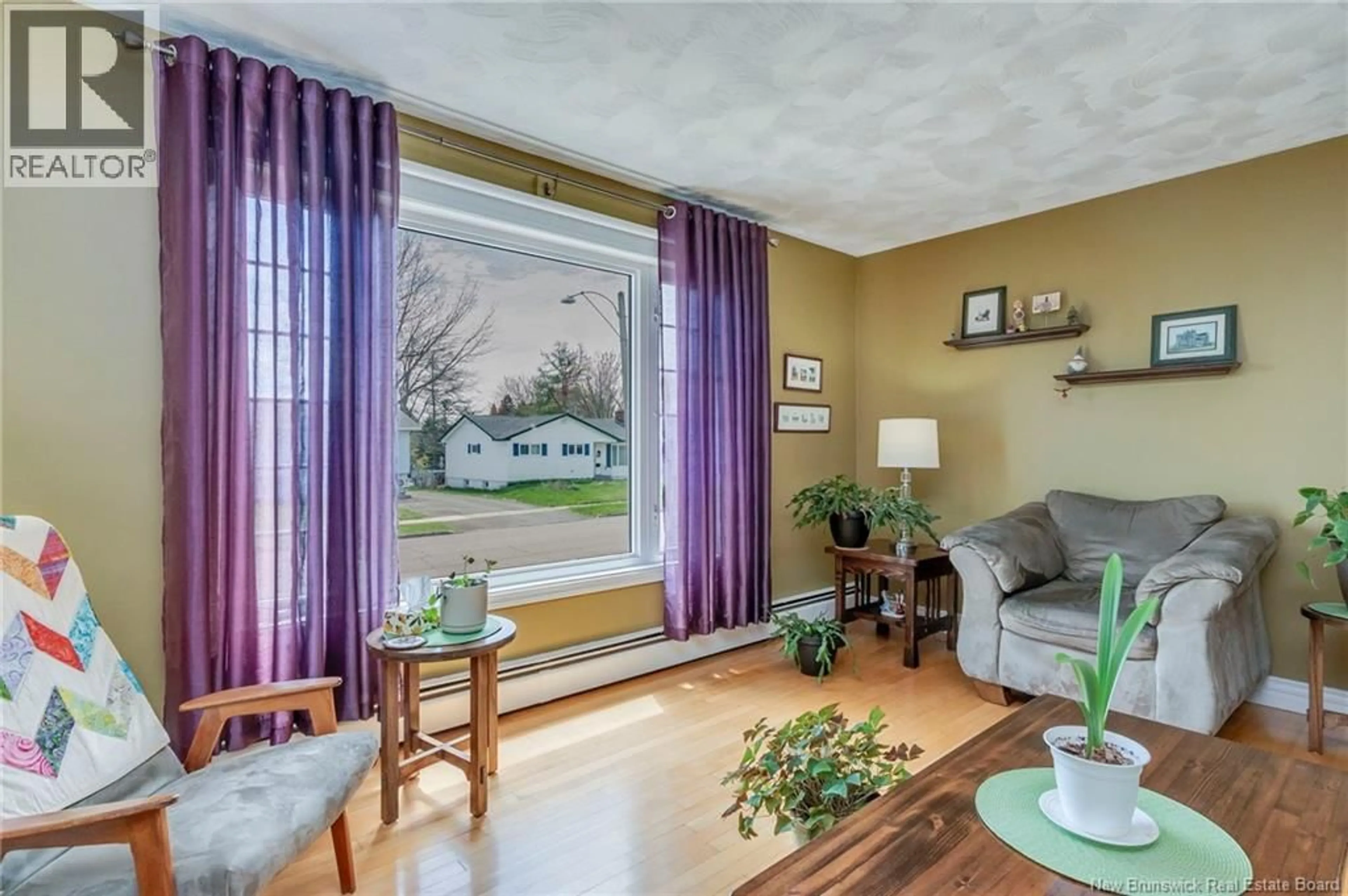 Living room with furniture, wood/laminate floor for 162 QUEEN MARY ROAD, Moncton New Brunswick E1A3P5