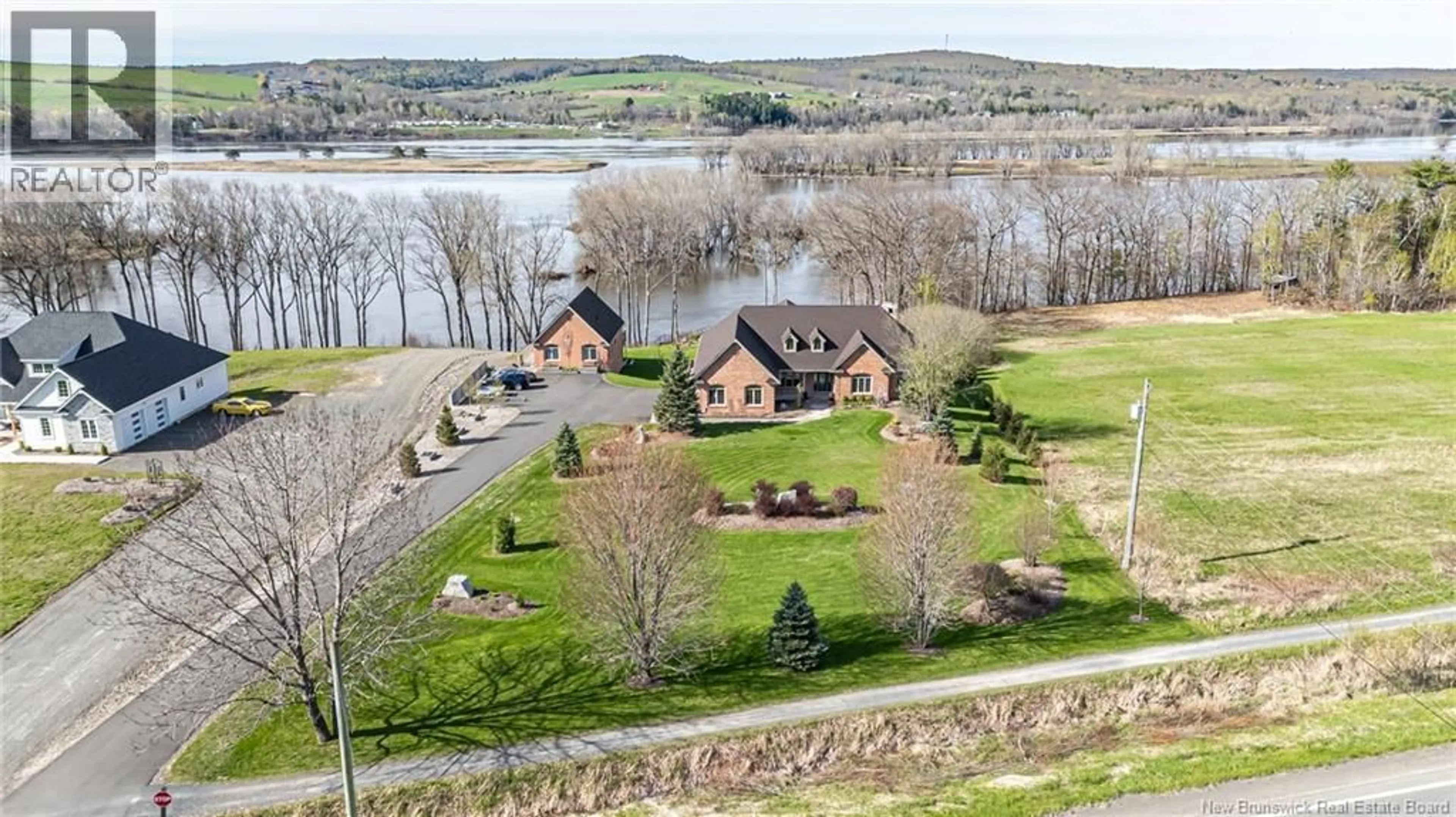 A pic from outside/outdoor area/front of a property/back of a property/a pic from drone, water/lake/river/ocean view for 1025 105 ROUTE ROUTE, Douglas New Brunswick E3A7L1