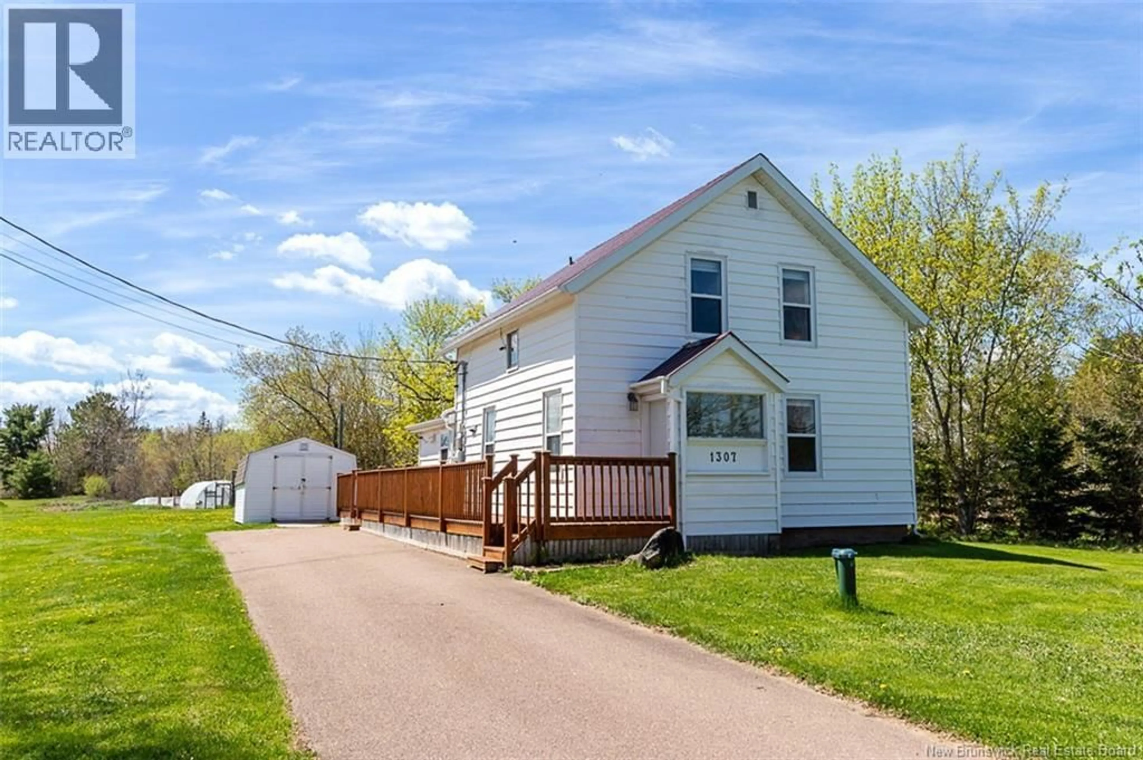 A pic from outside/outdoor area/front of a property/back of a property/a pic from drone, street for 1307 ROUTE 133, Grand-Barachois New Brunswick E4P8C7
