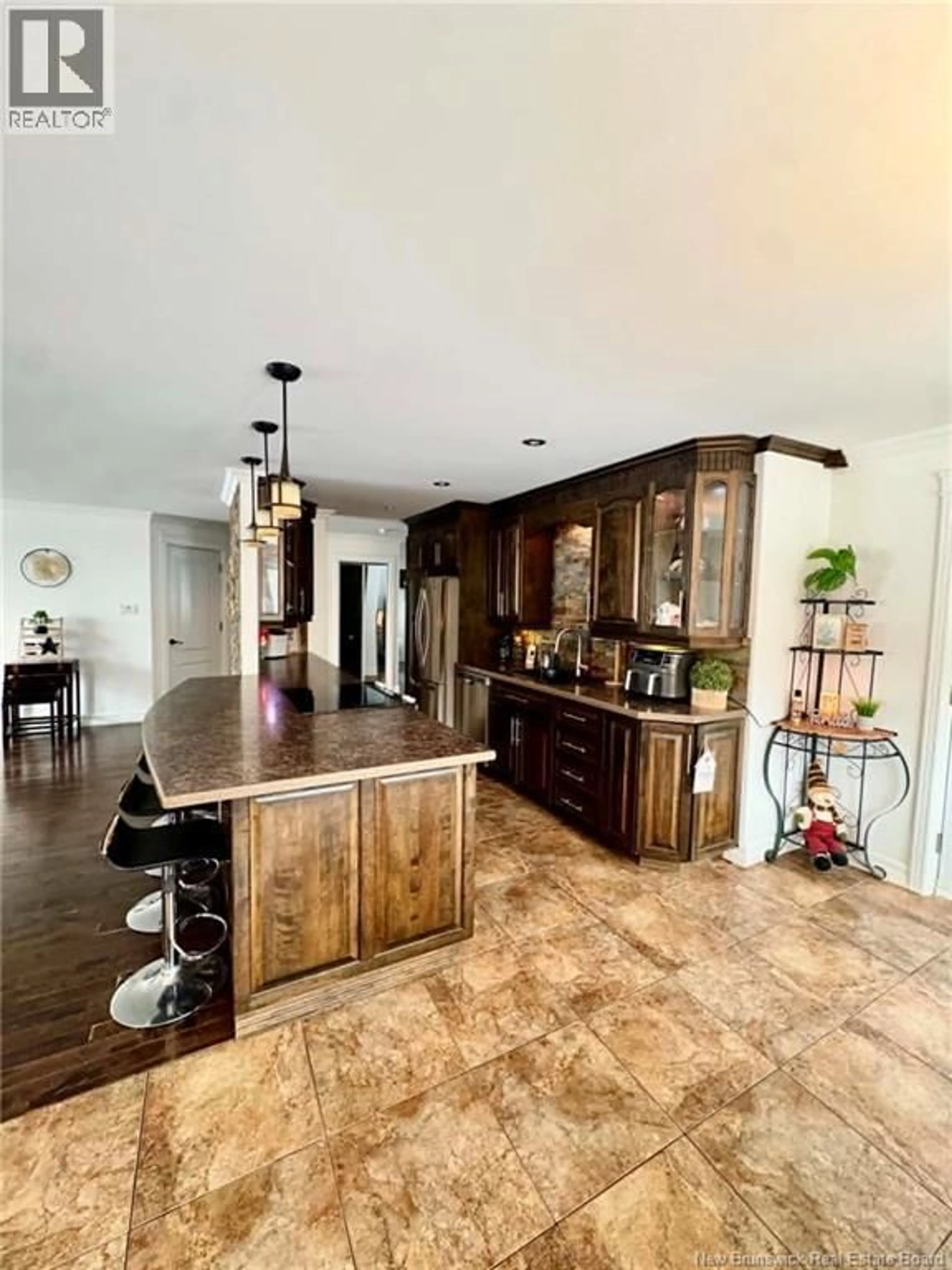 Open concept kitchen, ceramic/tile floor for 7 PERRON, Atholville New Brunswick E3N5L2