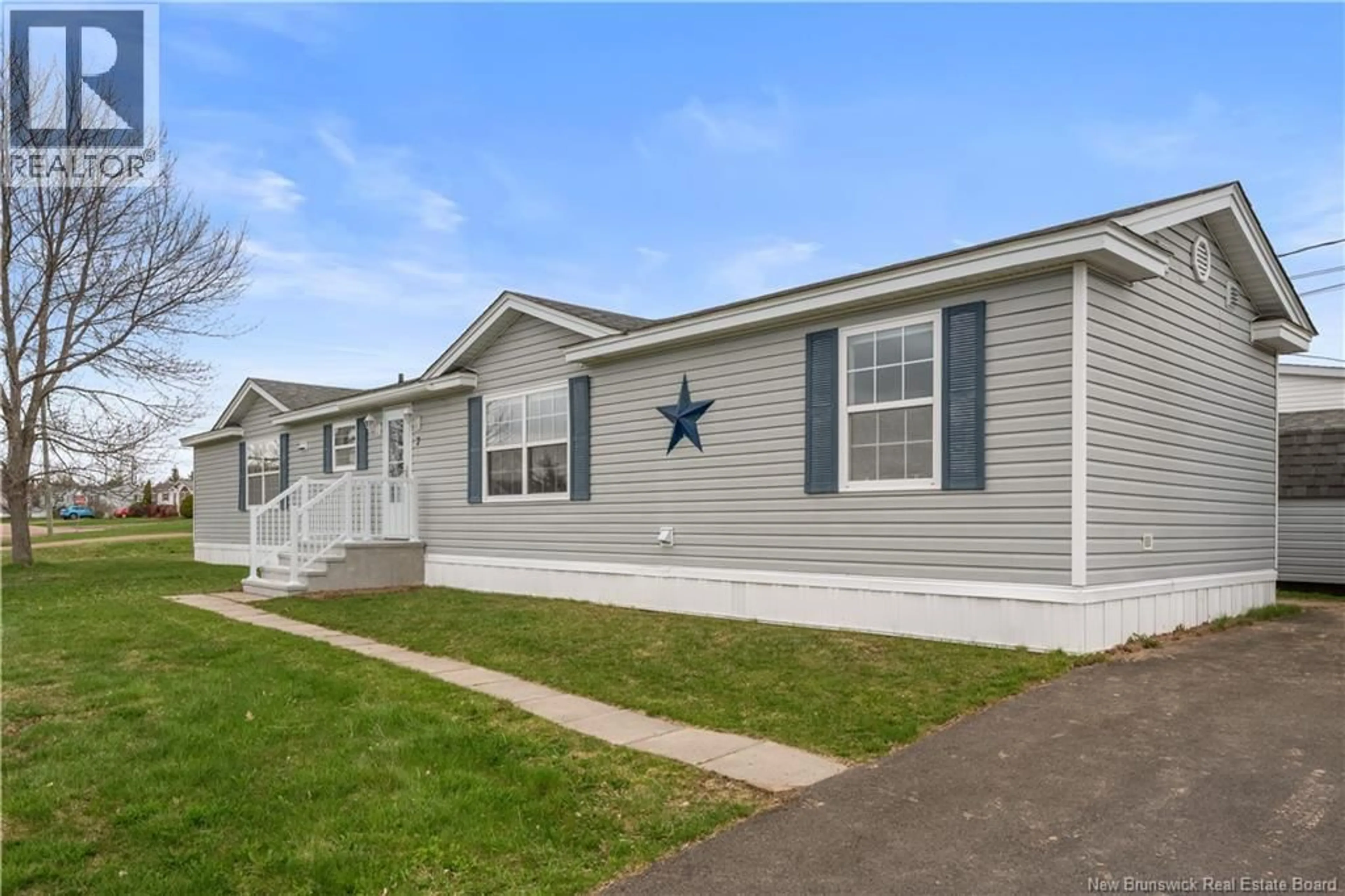 Home with vinyl exterior material, street for 7 ASPENWOOD STREET, Moncton New Brunswick E1H3L1