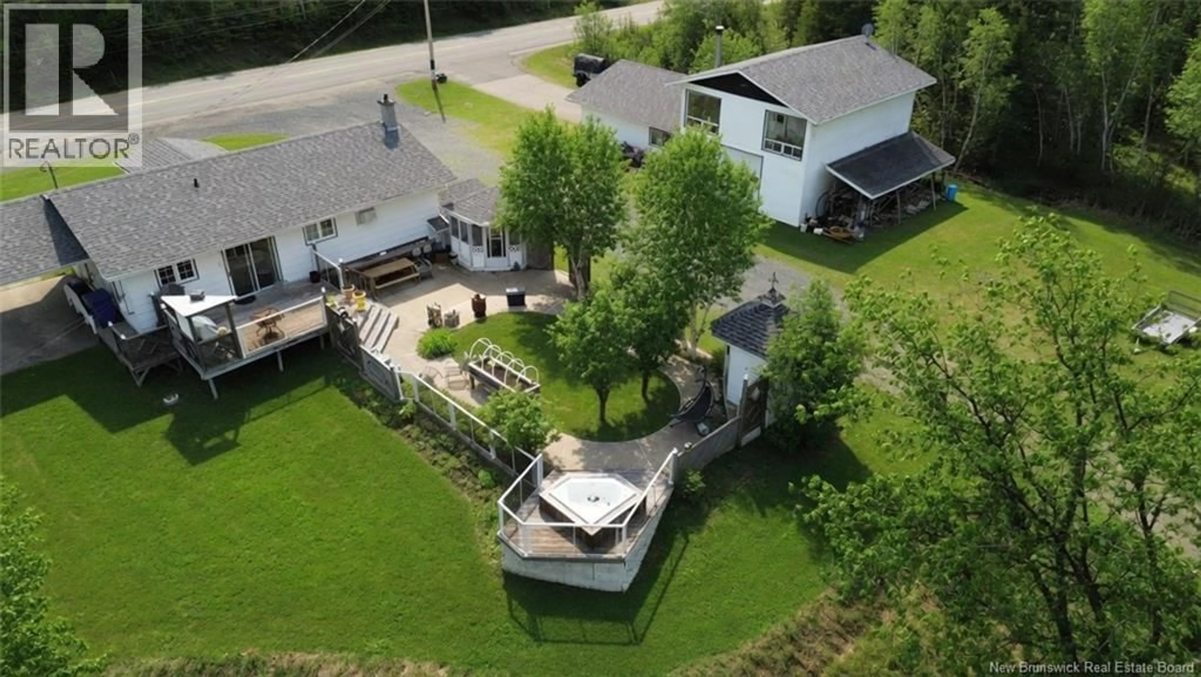 A pic from outside/outdoor area/front of a property/back of a property/a pic from drone, water/lake/river/ocean view for 2142 CHEMIN SORMANY, Sormany New Brunswick E8K2Y9
