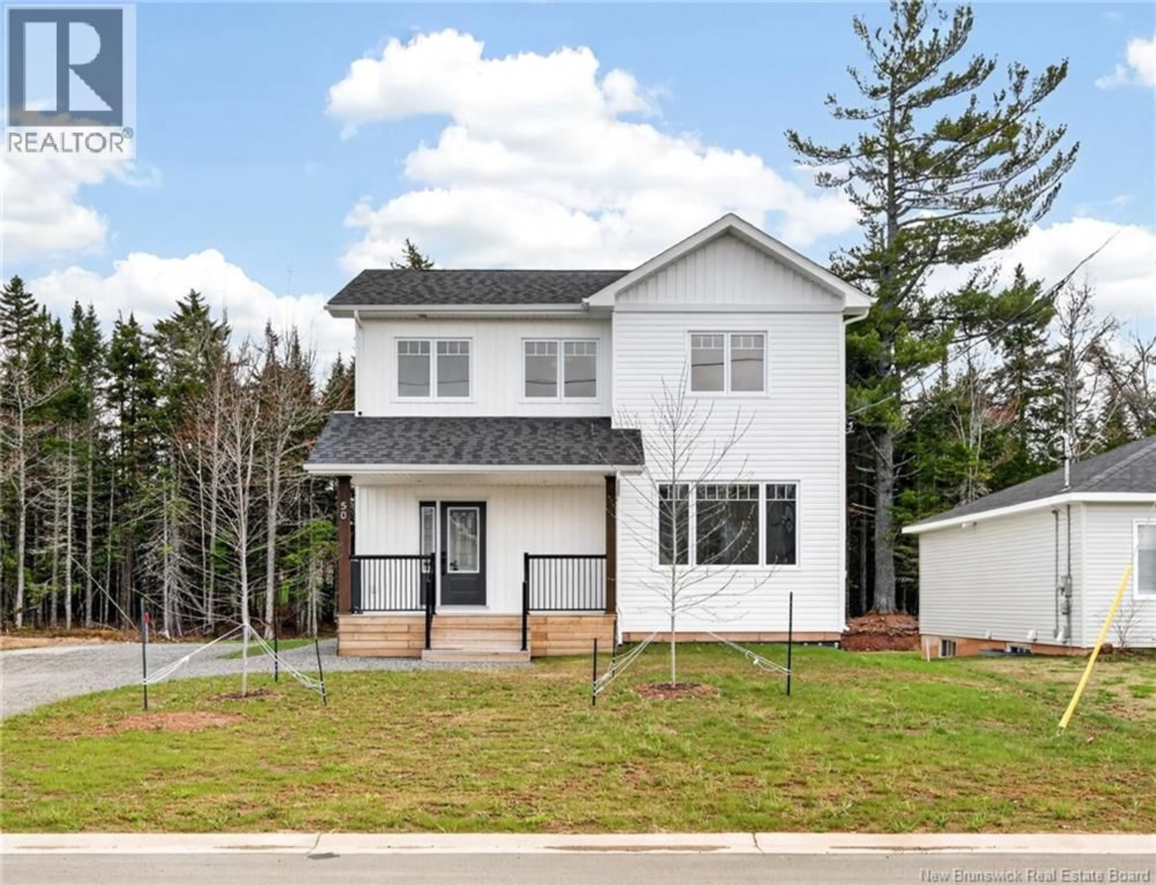 Home with vinyl exterior material, street for 50 CARTER STREET, Dieppe New Brunswick E1A0G4