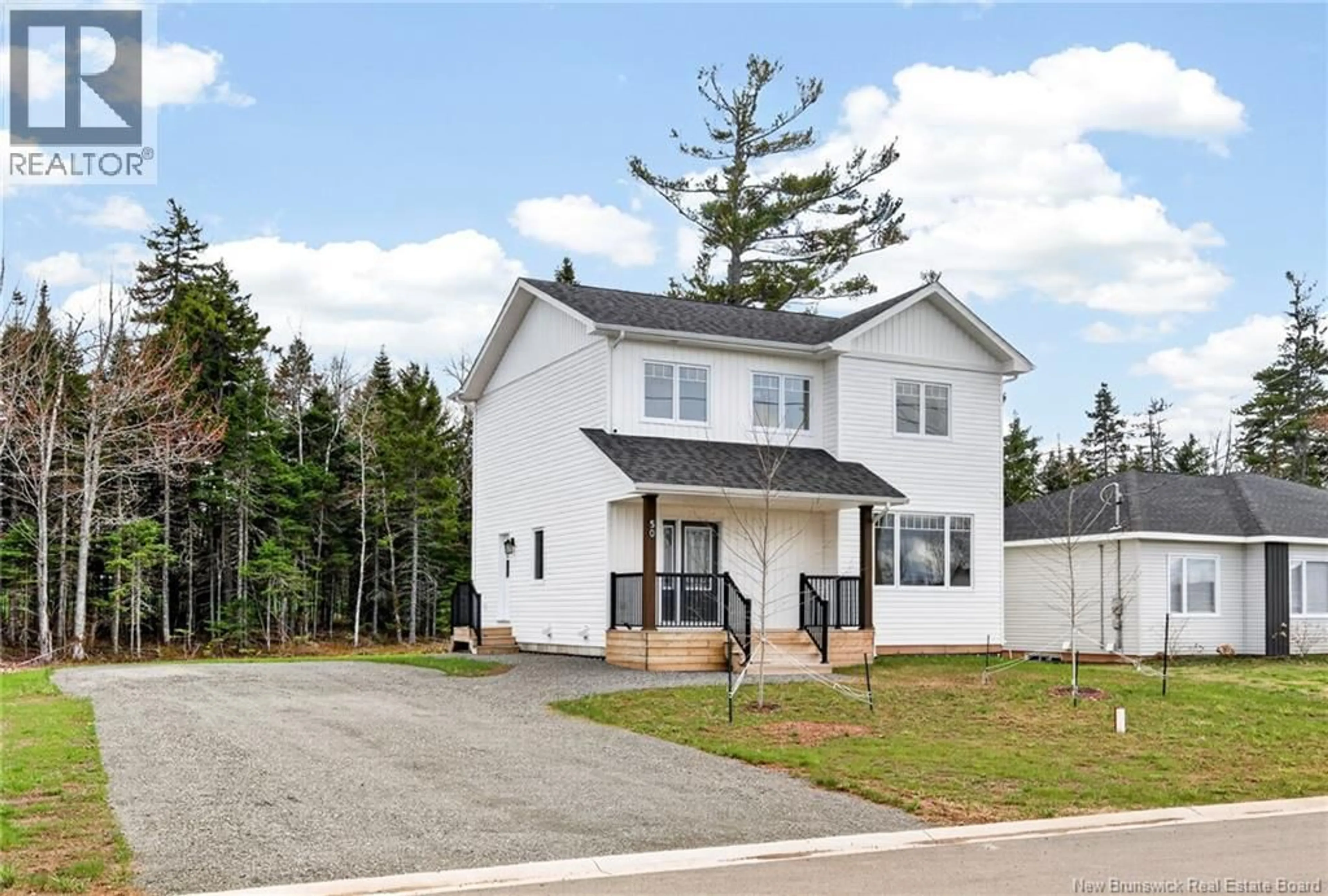 Home with vinyl exterior material, street for 50 CARTER STREET, Dieppe New Brunswick E1A0G4