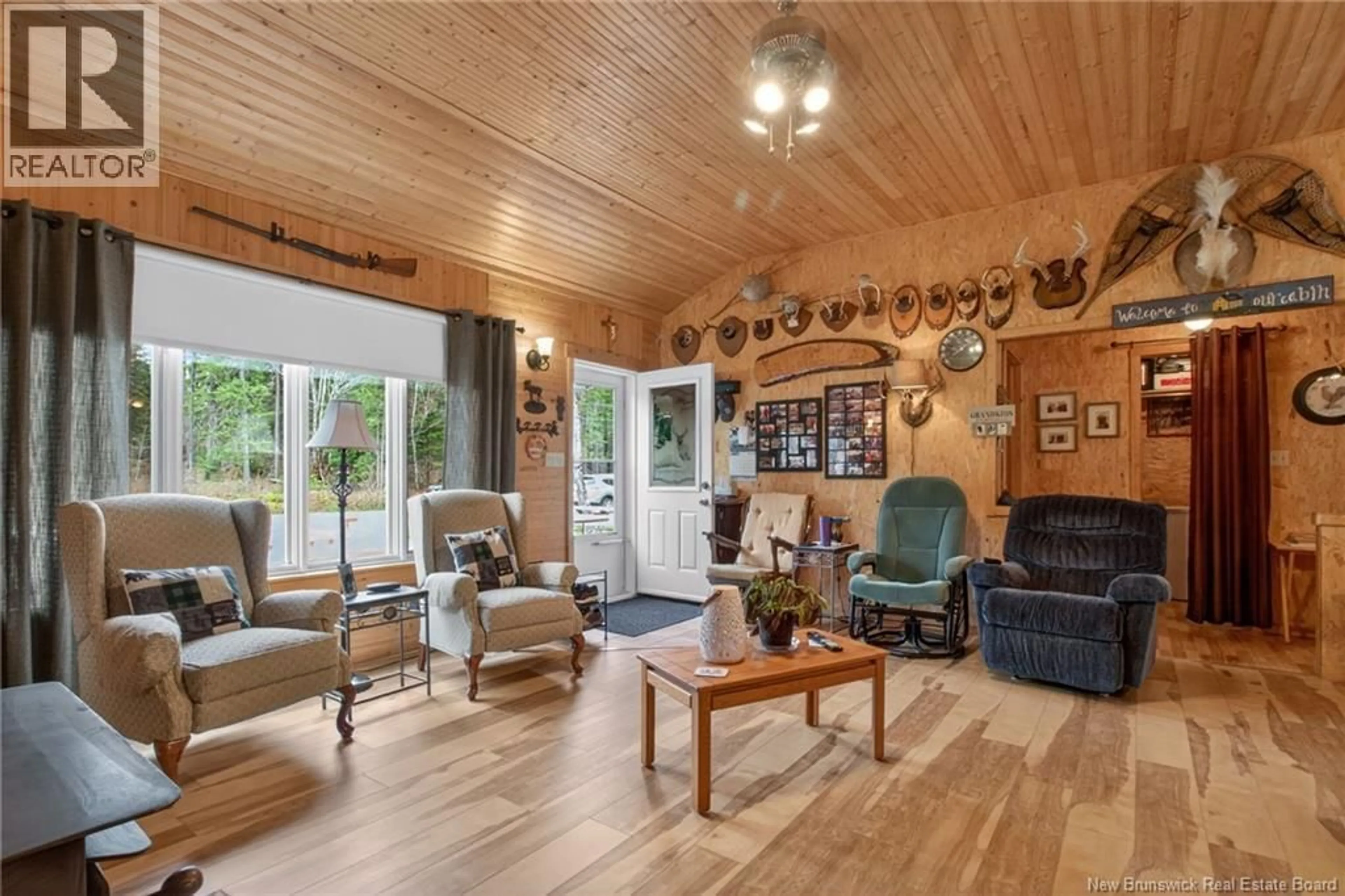 Living room with furniture, wood/laminate floor for 16 PERRY ROAD, Havelock New Brunswick E4Z5Z6