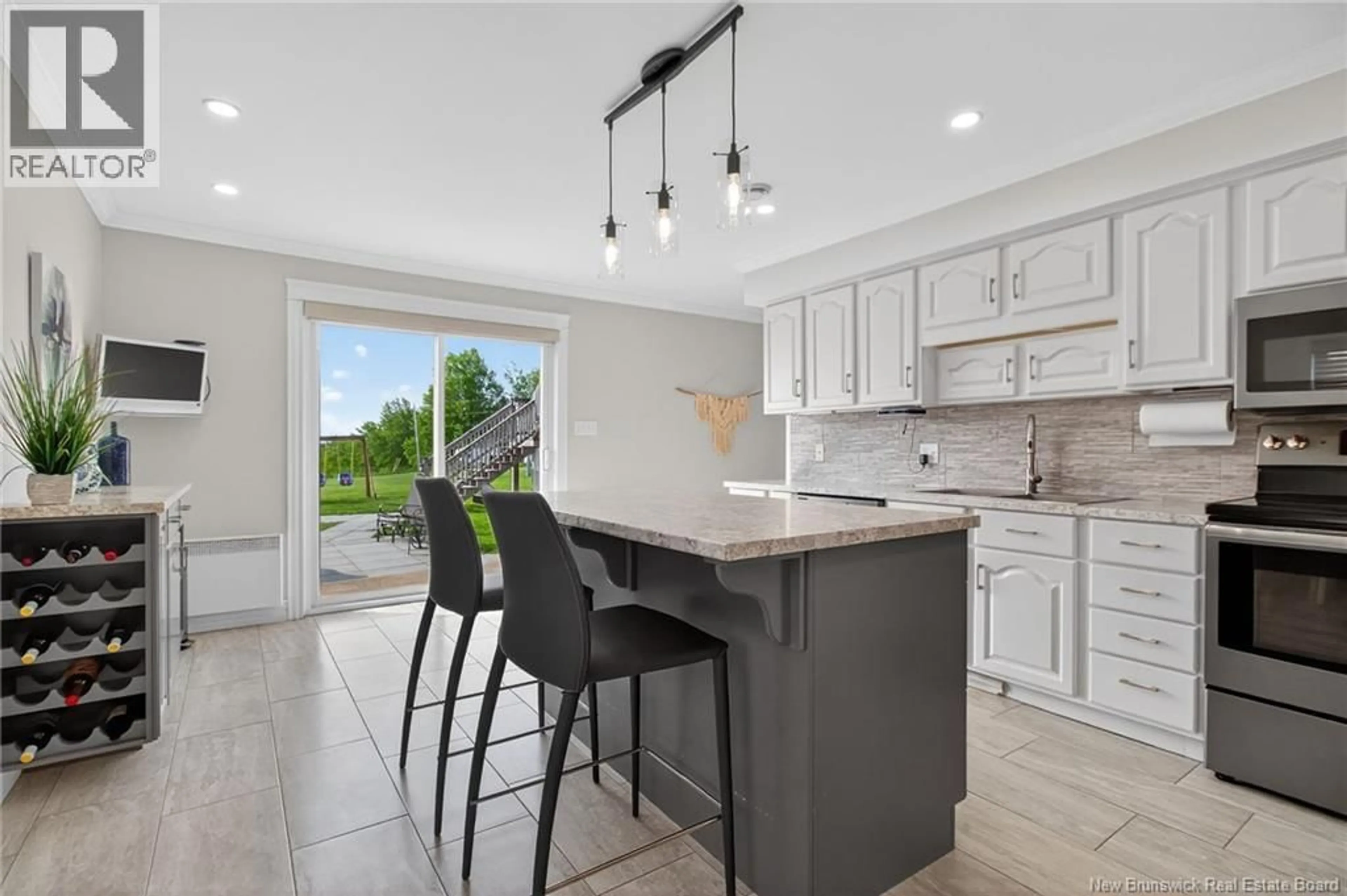Open concept kitchen, ceramic/tile floor for 1215 RTE 515, Bouctouche Cove New Brunswick E4S4J4