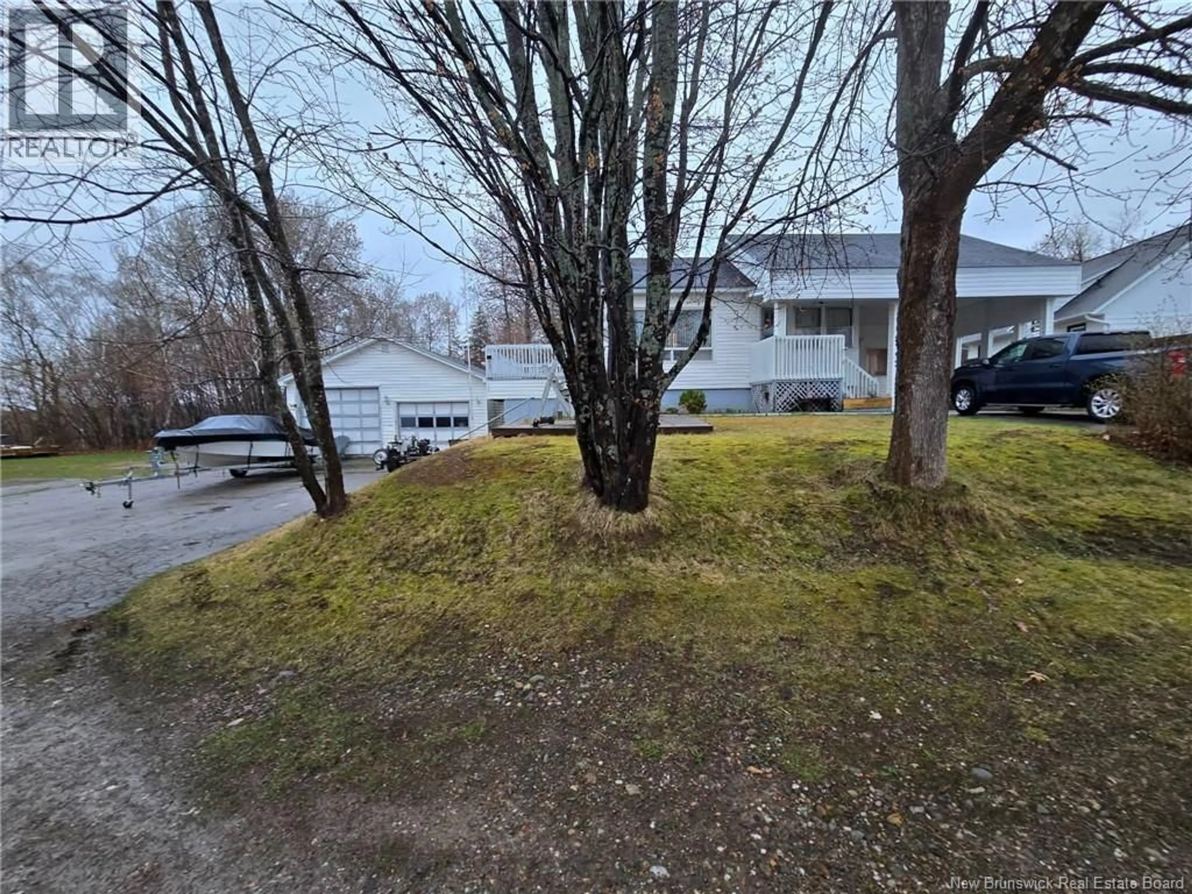 A pic from outside/outdoor area/front of a property/back of a property/a pic from drone, unknown for 1443 BRIDGE, Bathurst New Brunswick E2A4A5