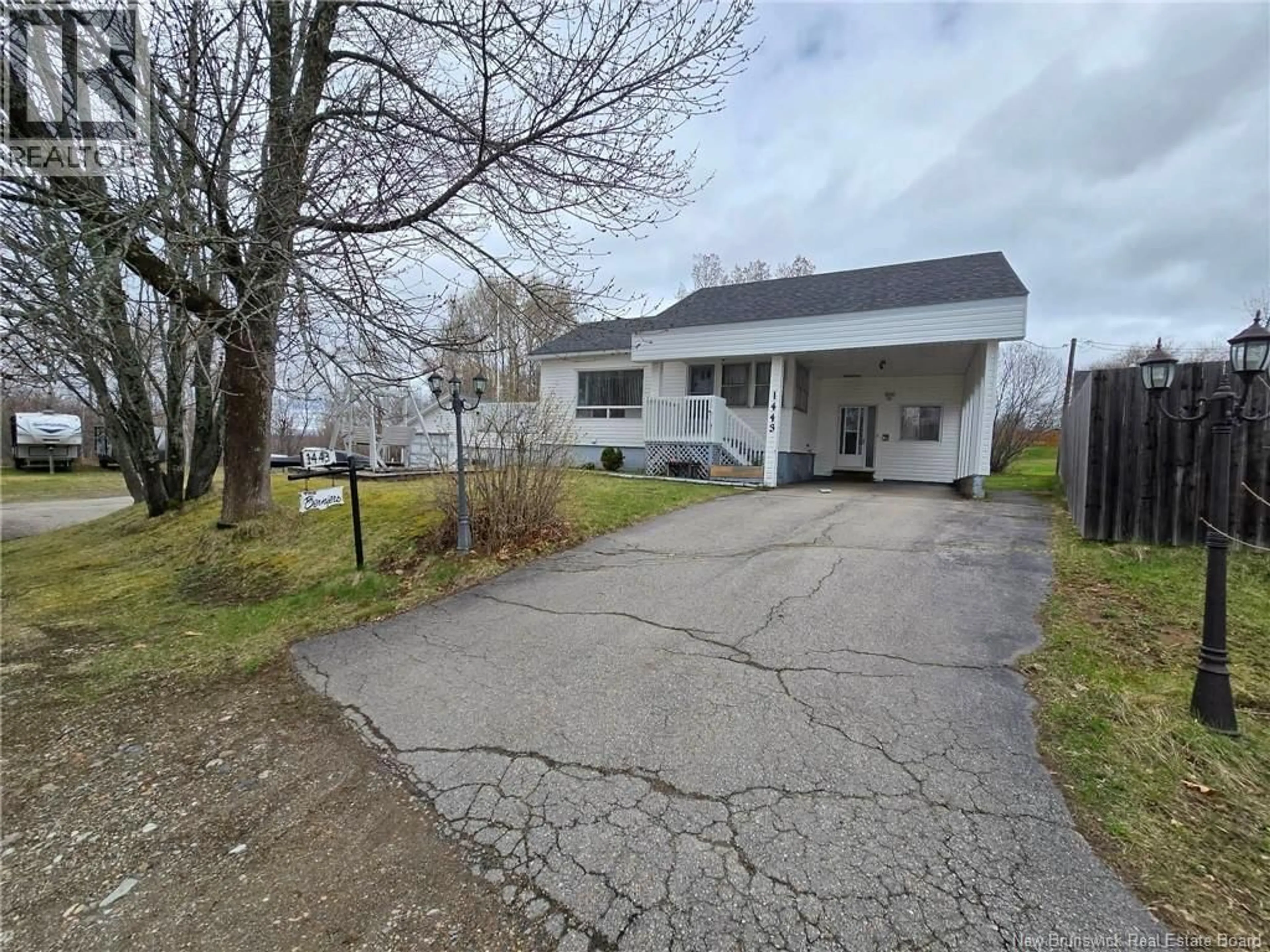 A pic from outside/outdoor area/front of a property/back of a property/a pic from drone, street for 1443 BRIDGE, Bathurst New Brunswick E2A4A5