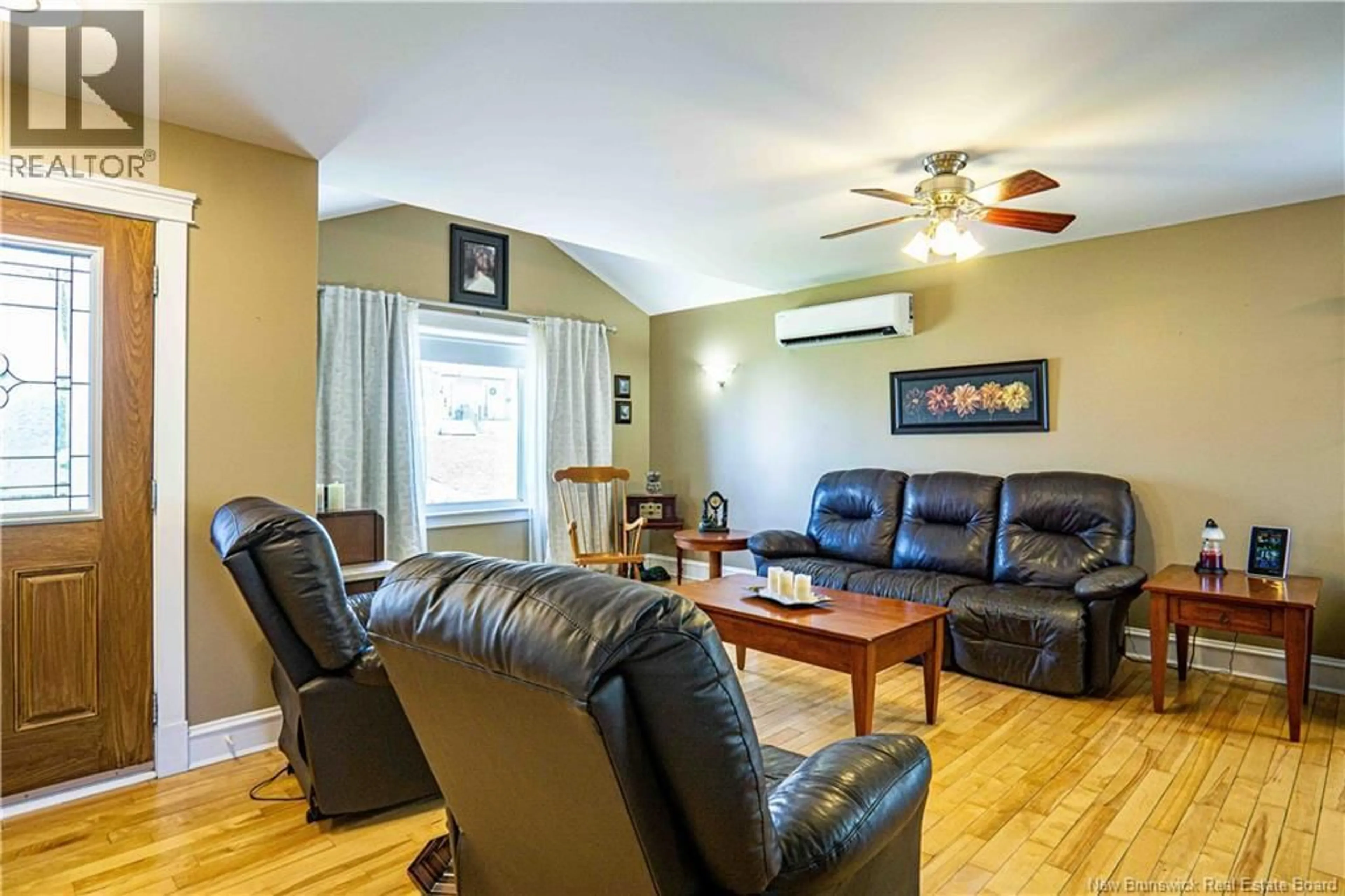 Living room with furniture, wood/laminate floor for 14 HARRIS STREET, Oromocto New Brunswick E2V0A6