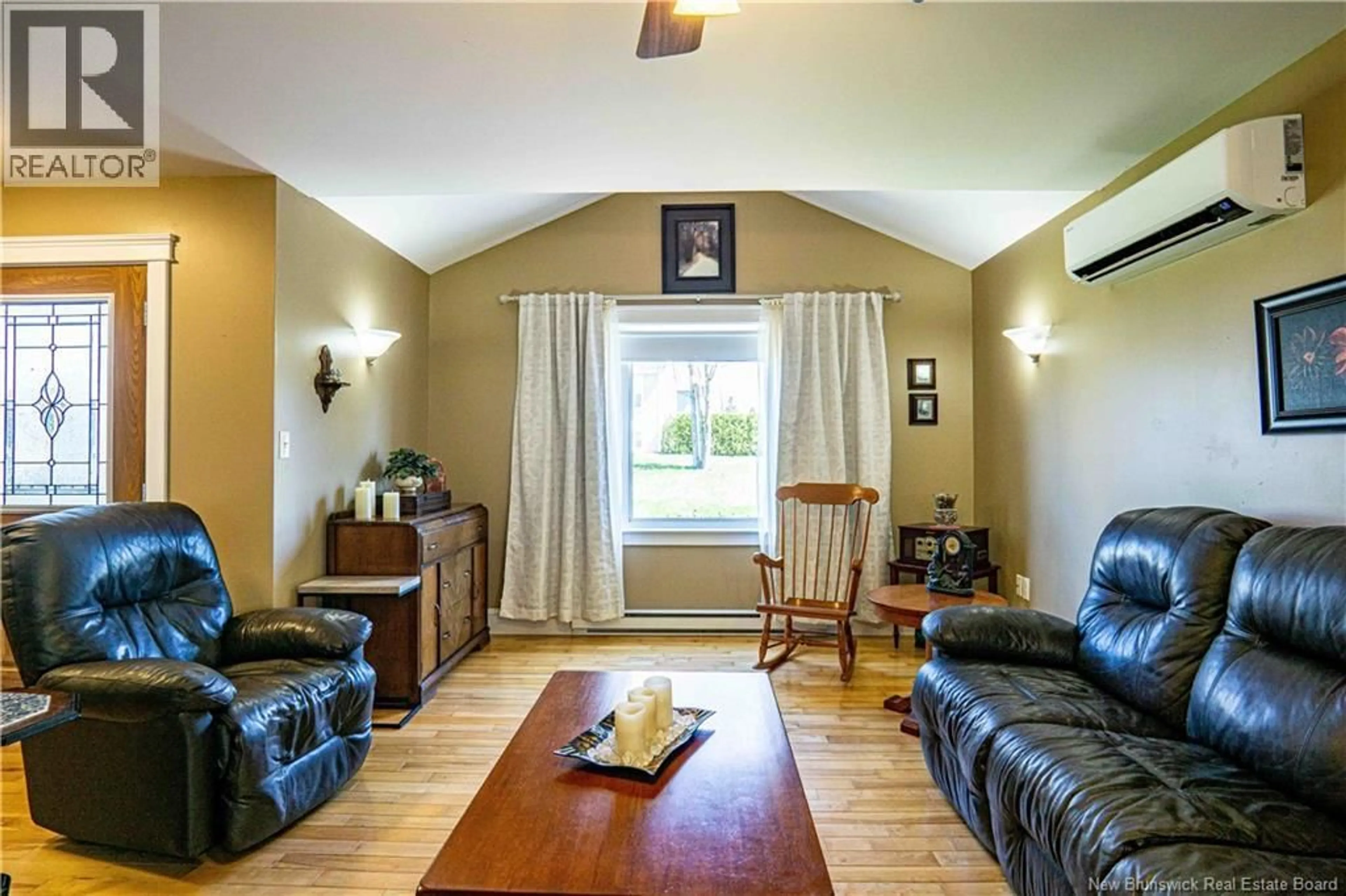 Living room with furniture, wood/laminate floor for 14 HARRIS STREET, Oromocto New Brunswick E2V0A6