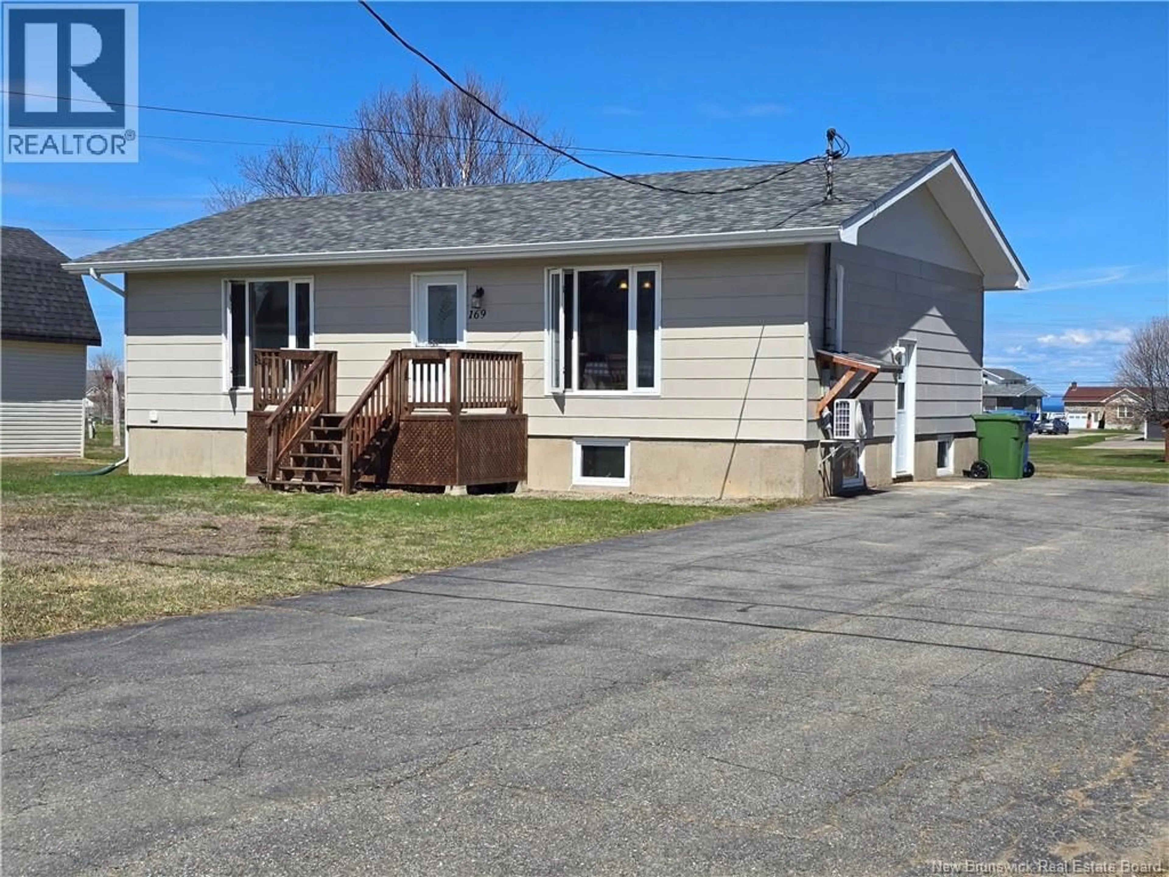 A pic from outside/outdoor area/front of a property/back of a property/a pic from drone, street for 169 RUE LOUIS DE LANTEIGNE RUE, Caraquet New Brunswick E1W1A9