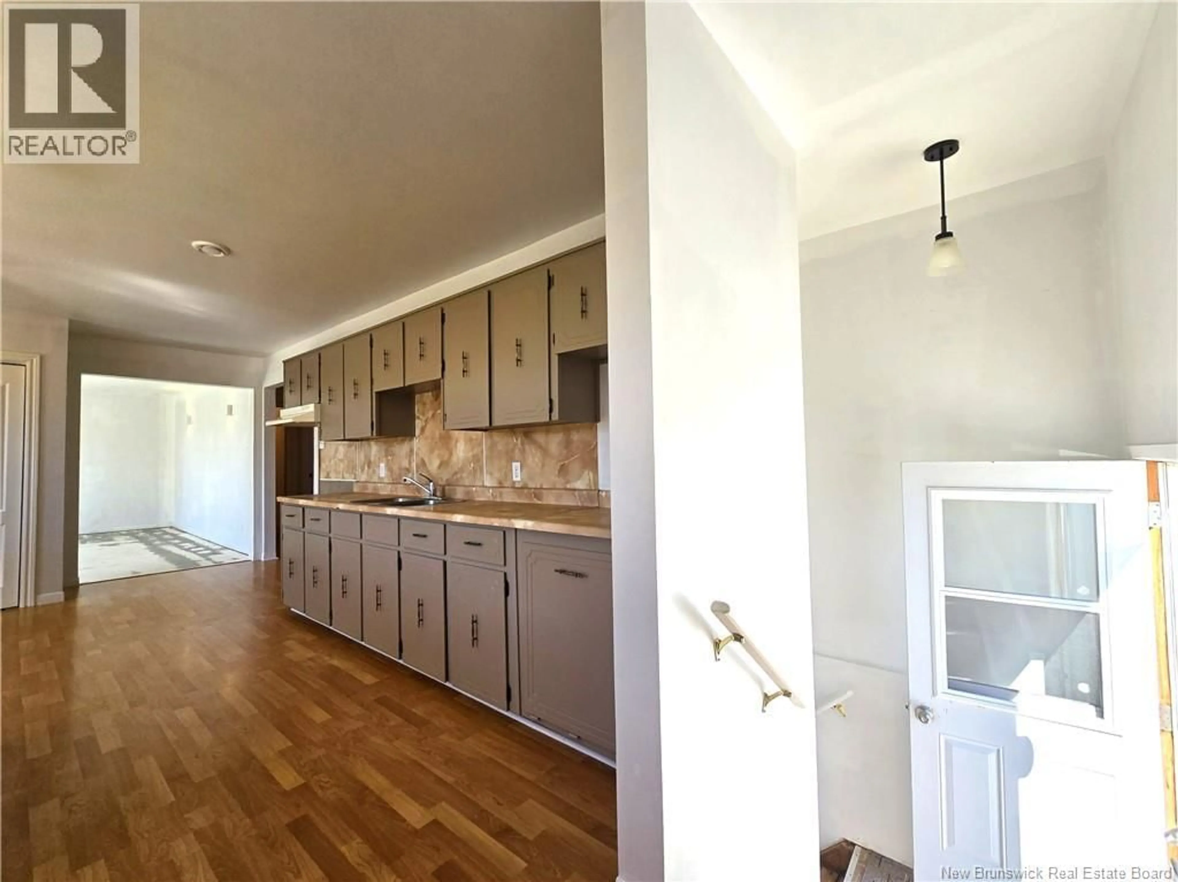 Open concept kitchen, unknown for 169 RUE LOUIS DE LANTEIGNE RUE, Caraquet New Brunswick E1W1A9