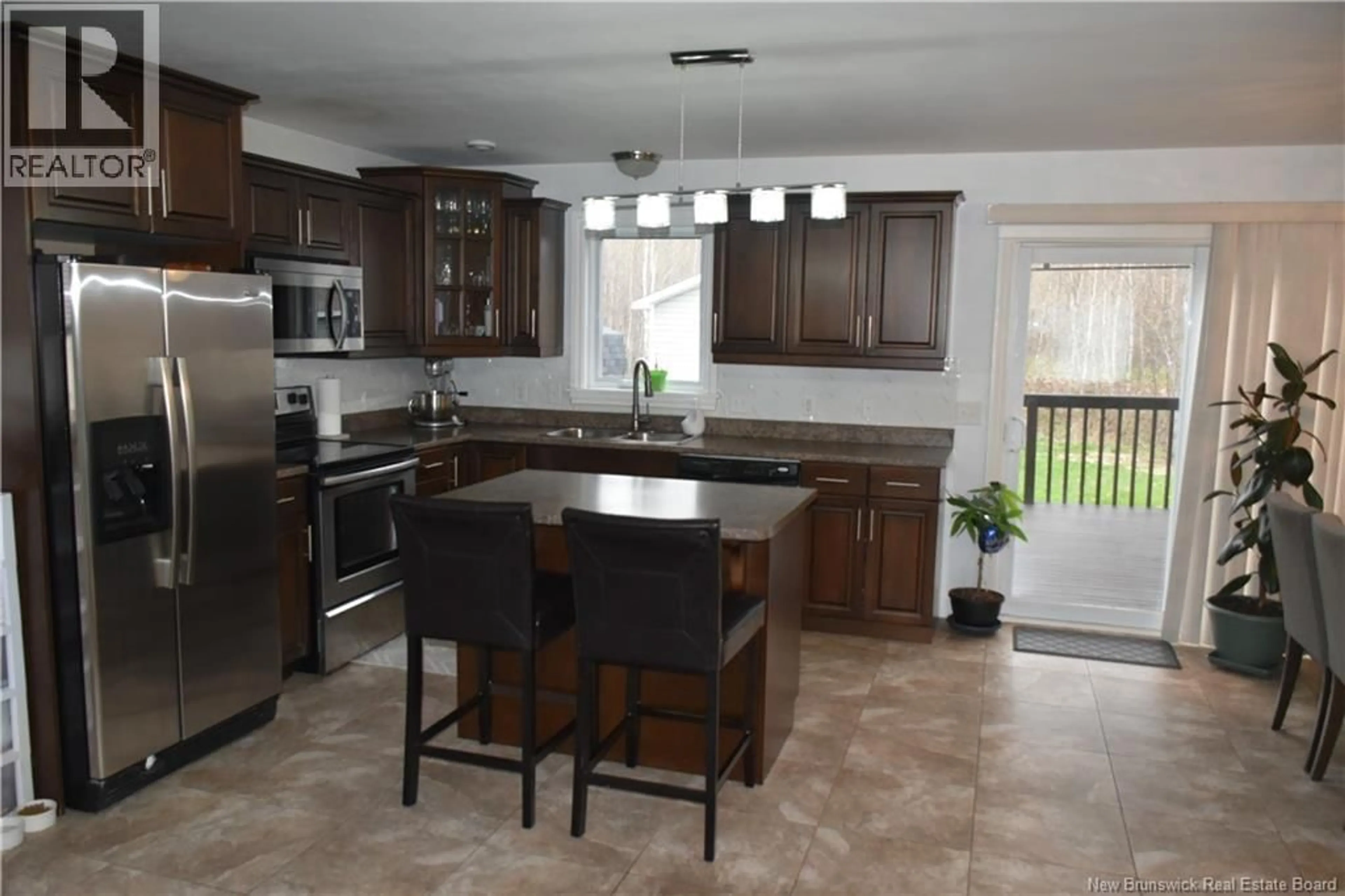 Open concept kitchen, ceramic/tile floor for 137 HOULAHAN STREET, Dieppe New Brunswick E1A4X6