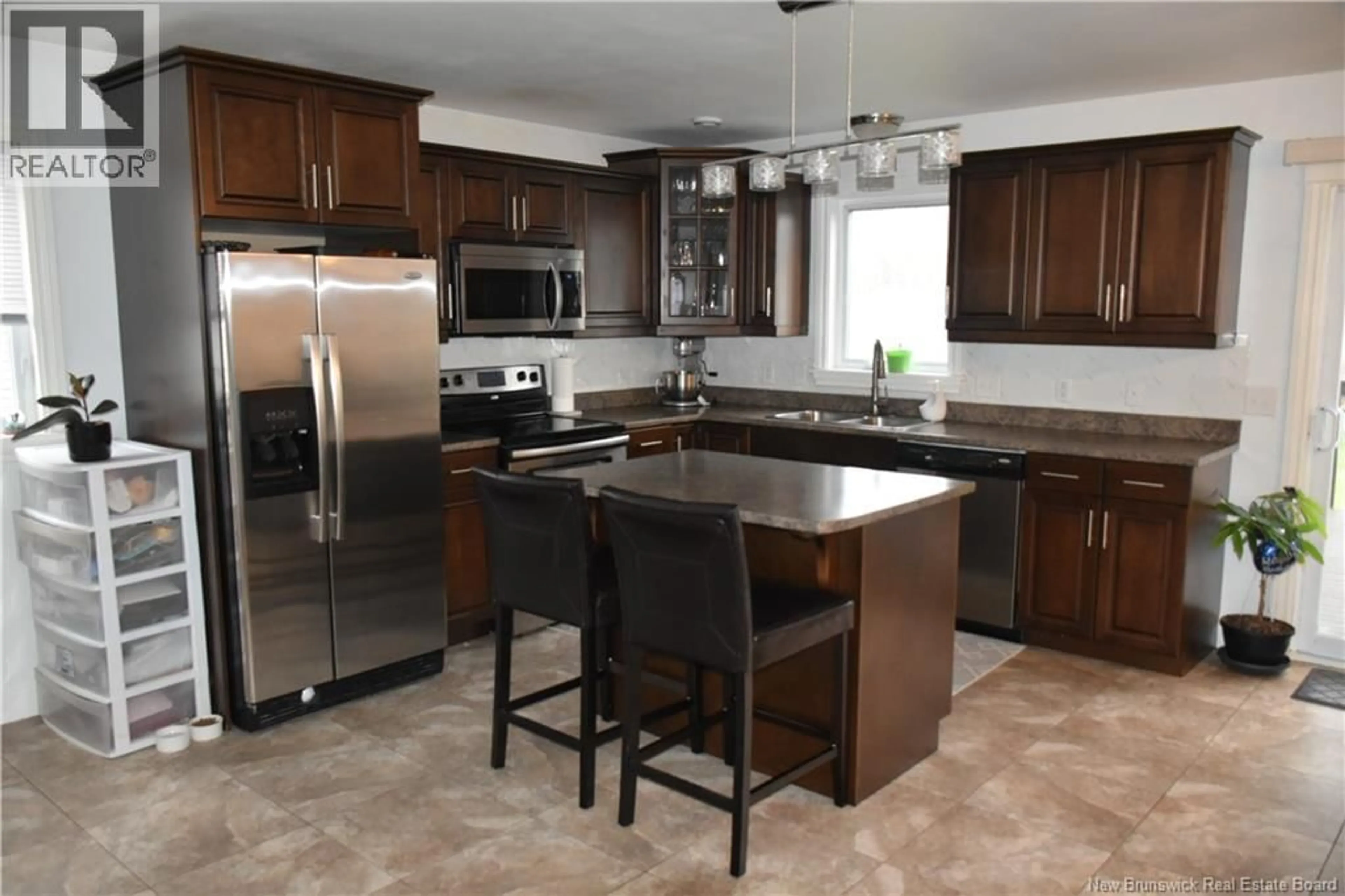 Open concept kitchen, ceramic/tile floor for 137 HOULAHAN STREET, Dieppe New Brunswick E1A4X6