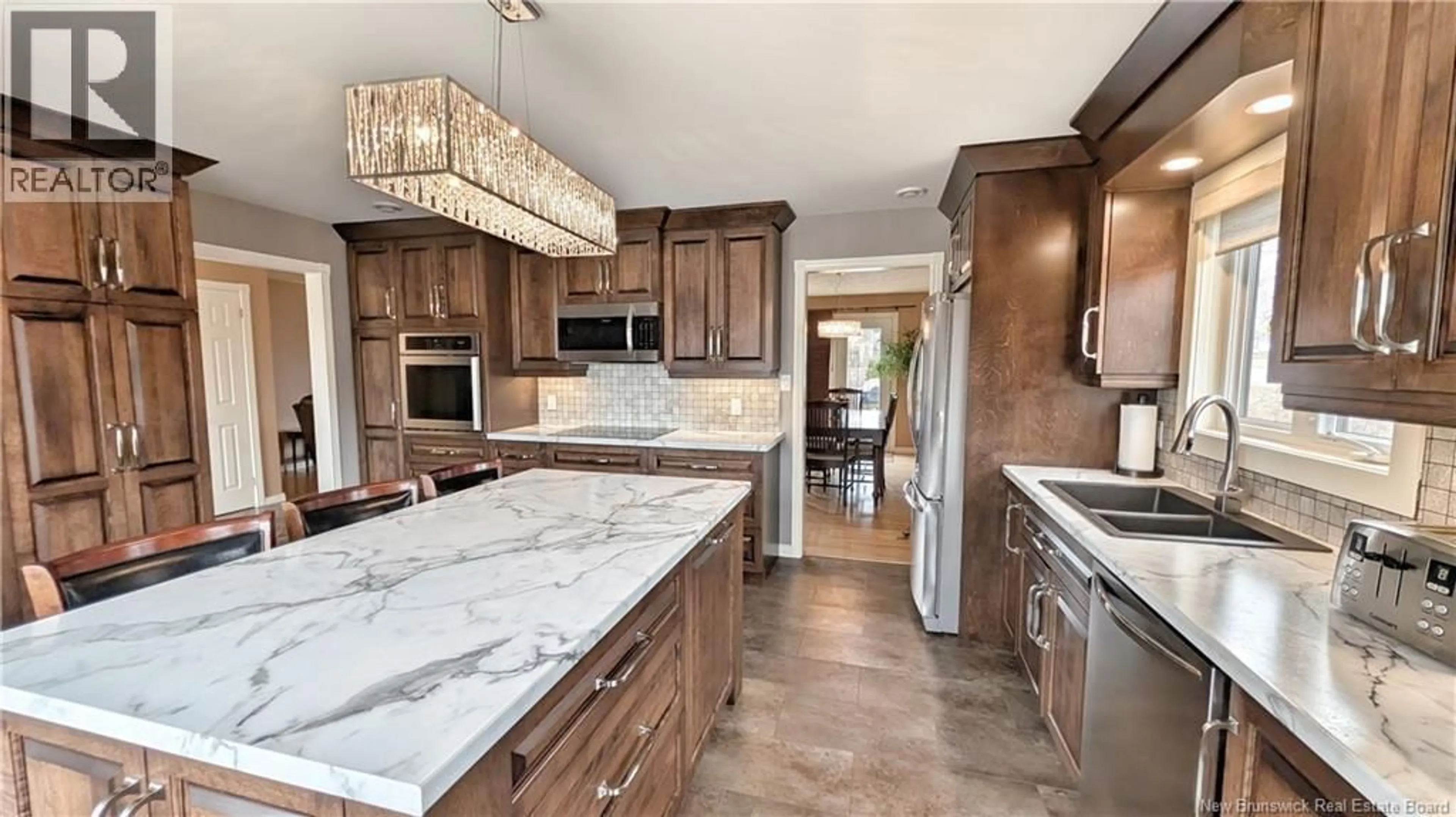 Open concept kitchen, ceramic/tile floor for 499 CARTER COURT, Bathurst New Brunswick E2A4S1