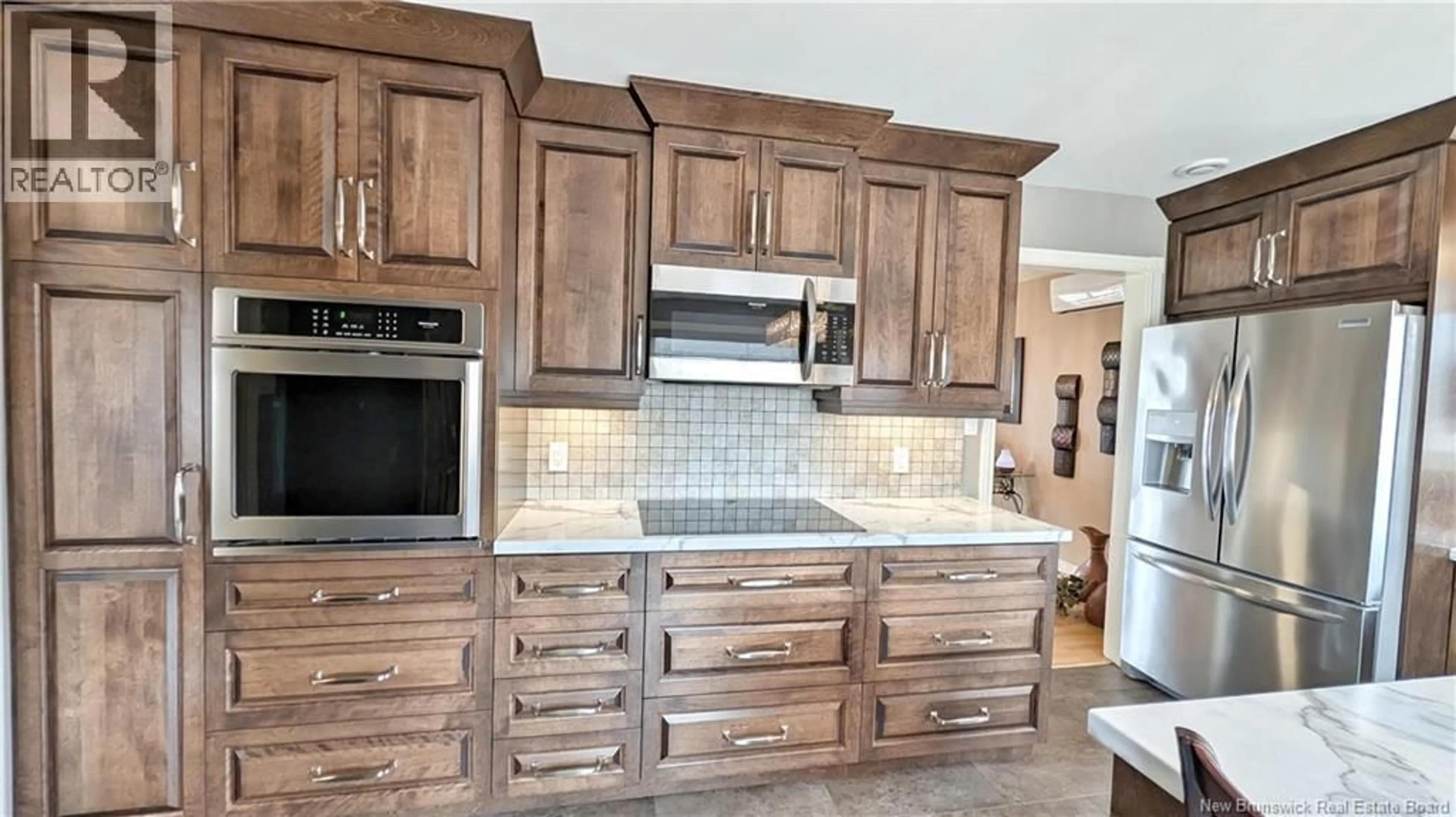 Open concept kitchen, ceramic/tile floor for 499 CARTER COURT, Bathurst New Brunswick E2A4S1