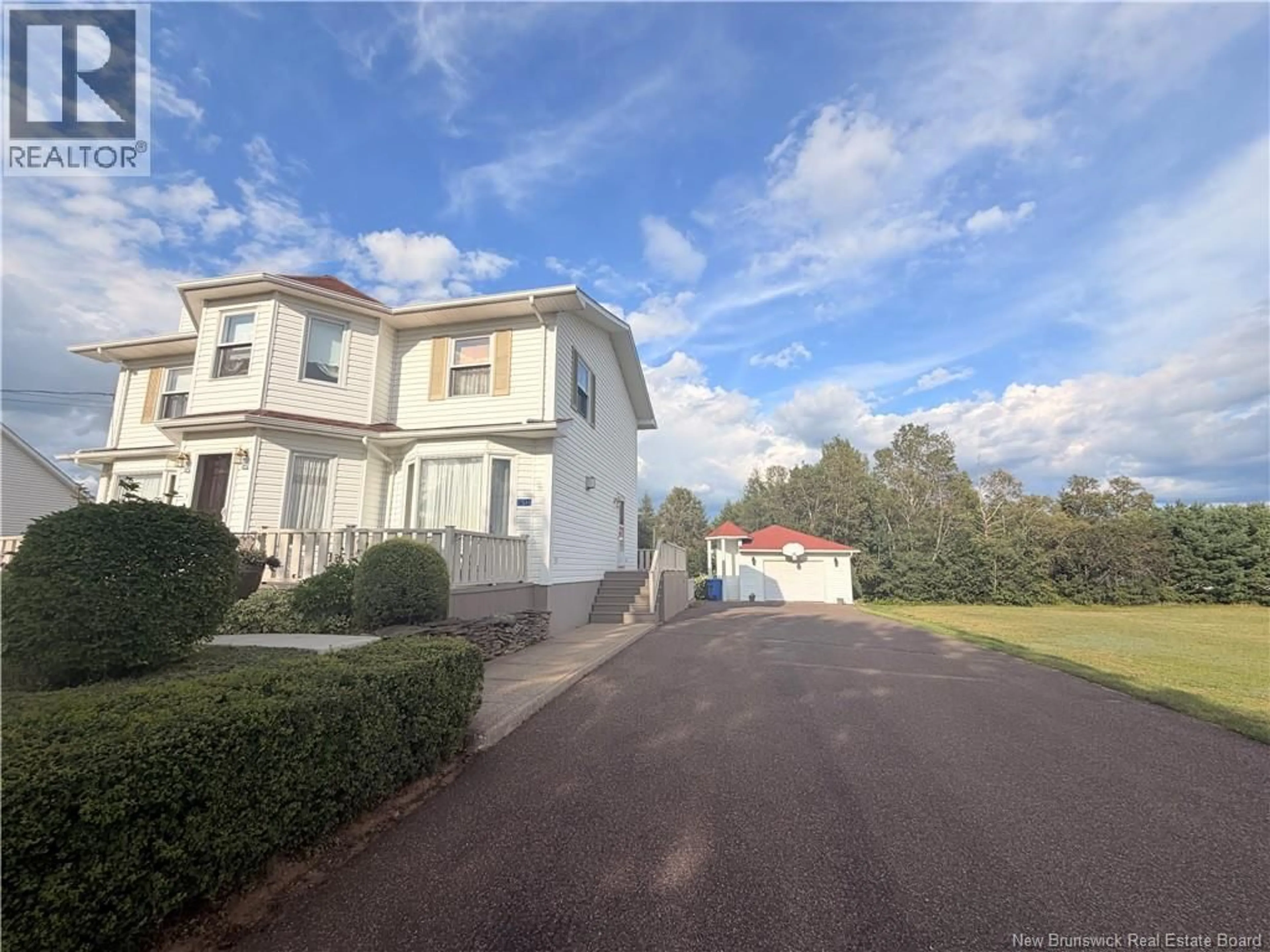 A pic from outside/outdoor area/front of a property/back of a property/a pic from drone, street for 154 RUE SAVOIE, Neguac New Brunswick E9G1W8