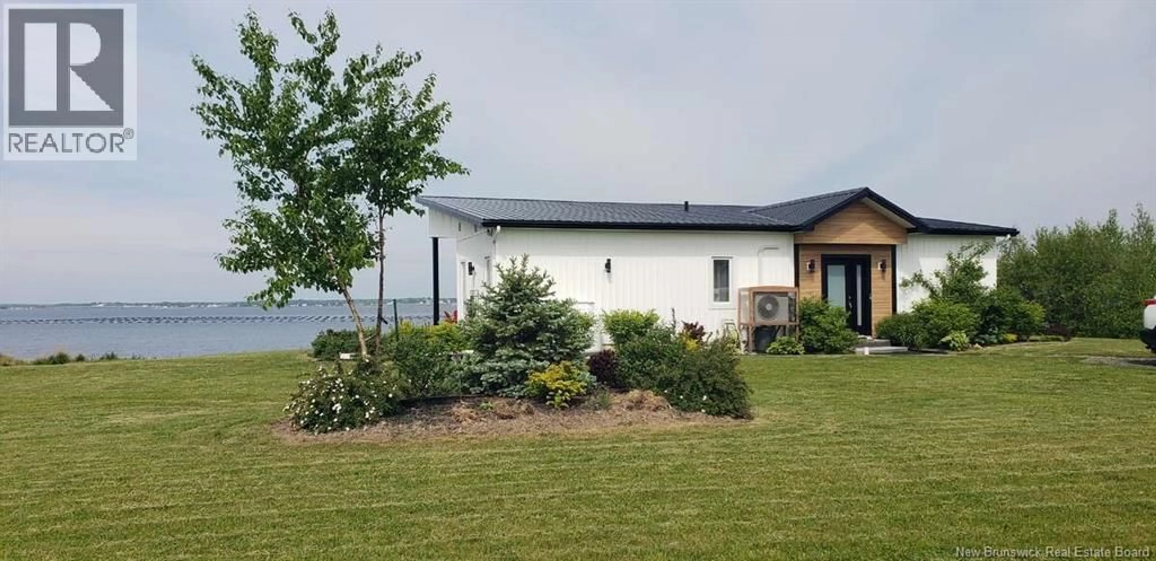 A pic from outside/outdoor area/front of a property/back of a property/a pic from drone, water/lake/river/ocean view for 3398 ROUTE 530, Cap-De-Cocagne New Brunswick E4R5N9