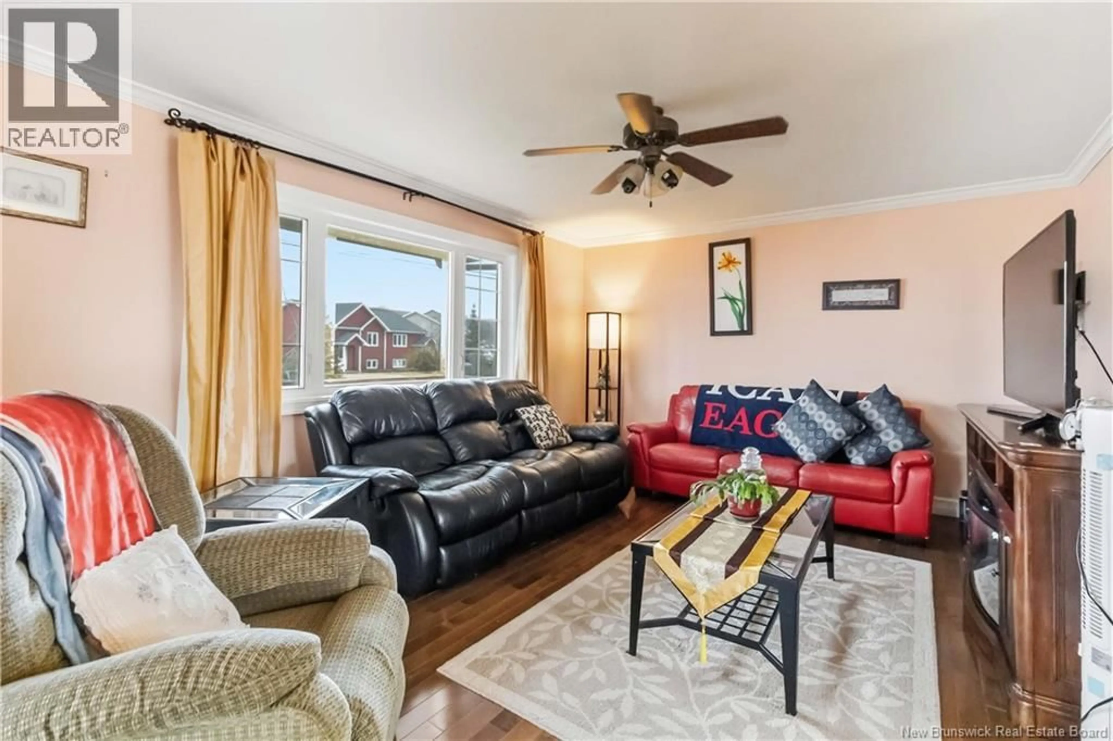 Living room with furniture, wood/laminate floor for 5 CARLSON STREET, Moncton New Brunswick E1G5N4