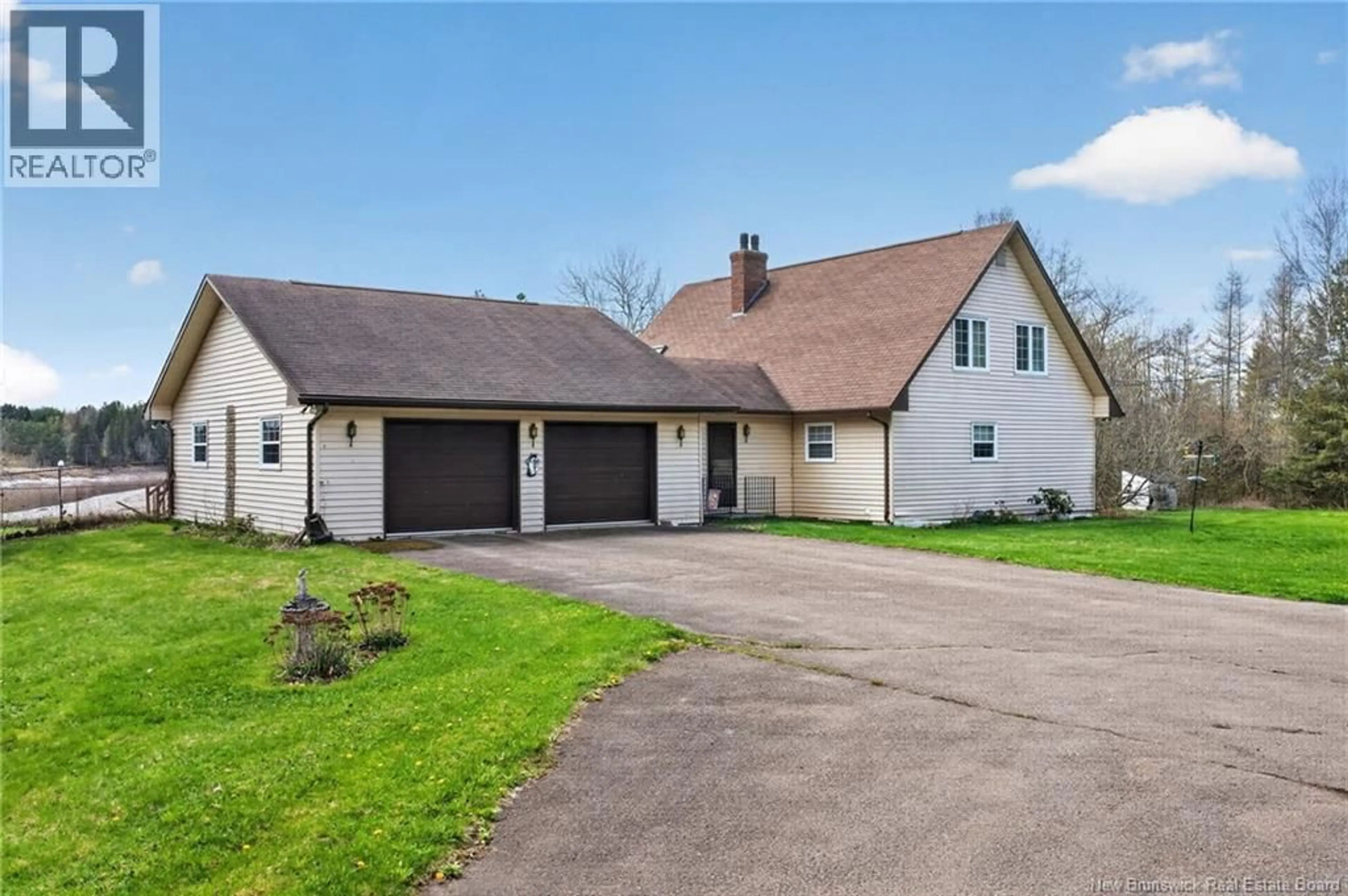 A pic from outside/outdoor area/front of a property/back of a property/a pic from drone, street for 2402 ROUTE 106, Boundary Creek New Brunswick E1G4L8
