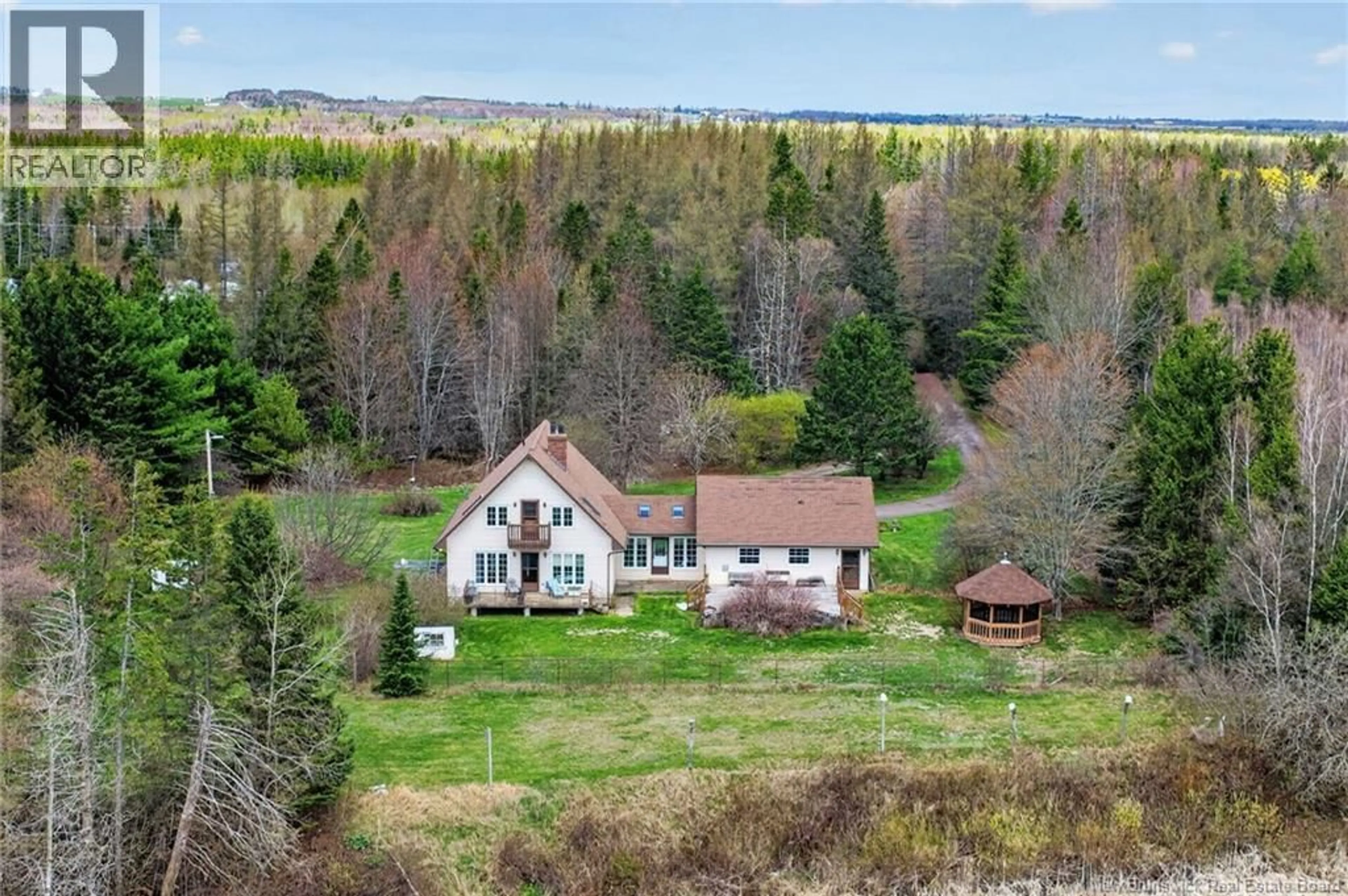 A pic from outside/outdoor area/front of a property/back of a property/a pic from drone, unknown for 2402 ROUTE 106, Boundary Creek New Brunswick E1G4L8