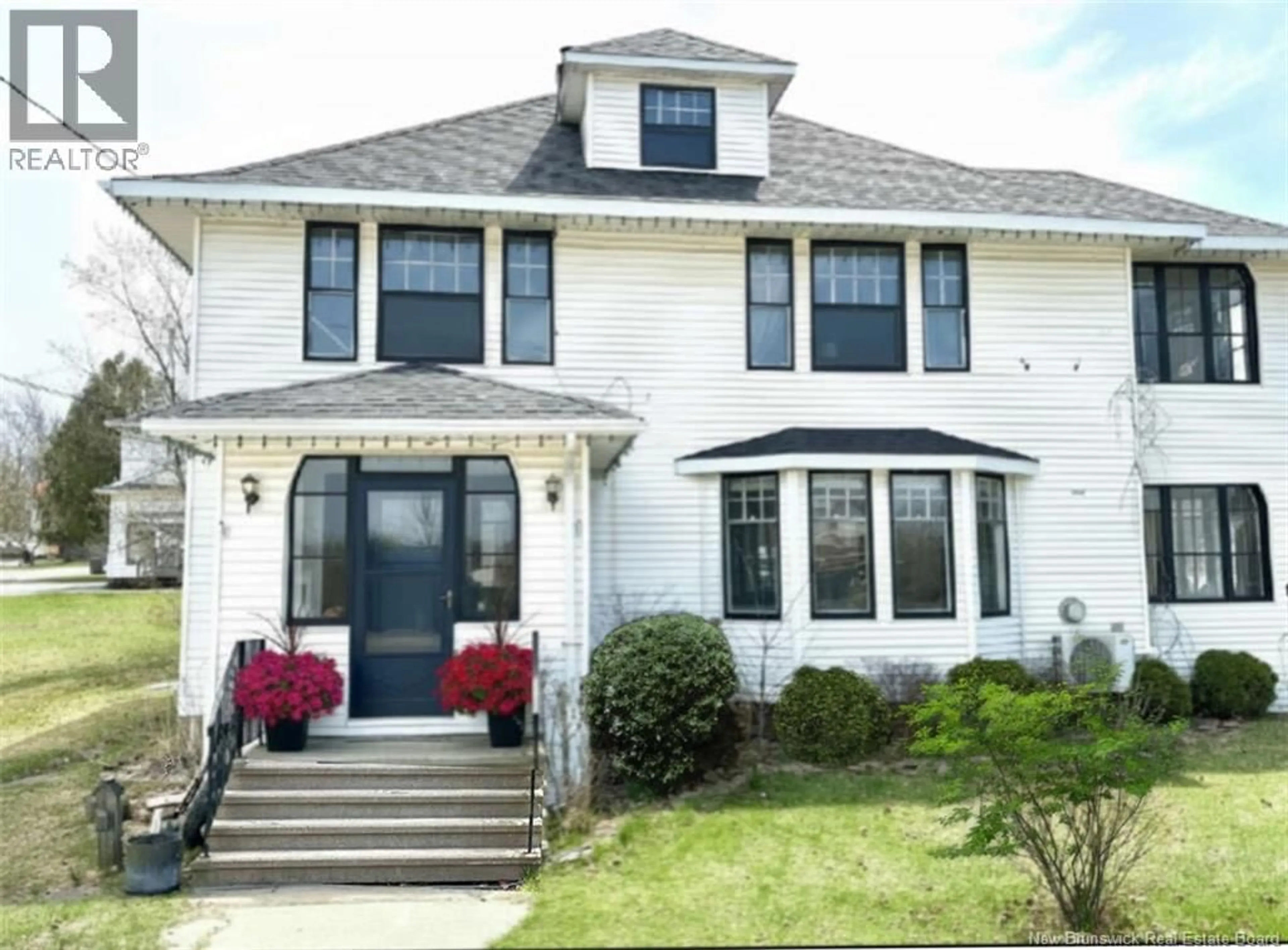 Home with vinyl exterior material, street for 209 MAIN STREET, Chipman New Brunswick E4A1X3
