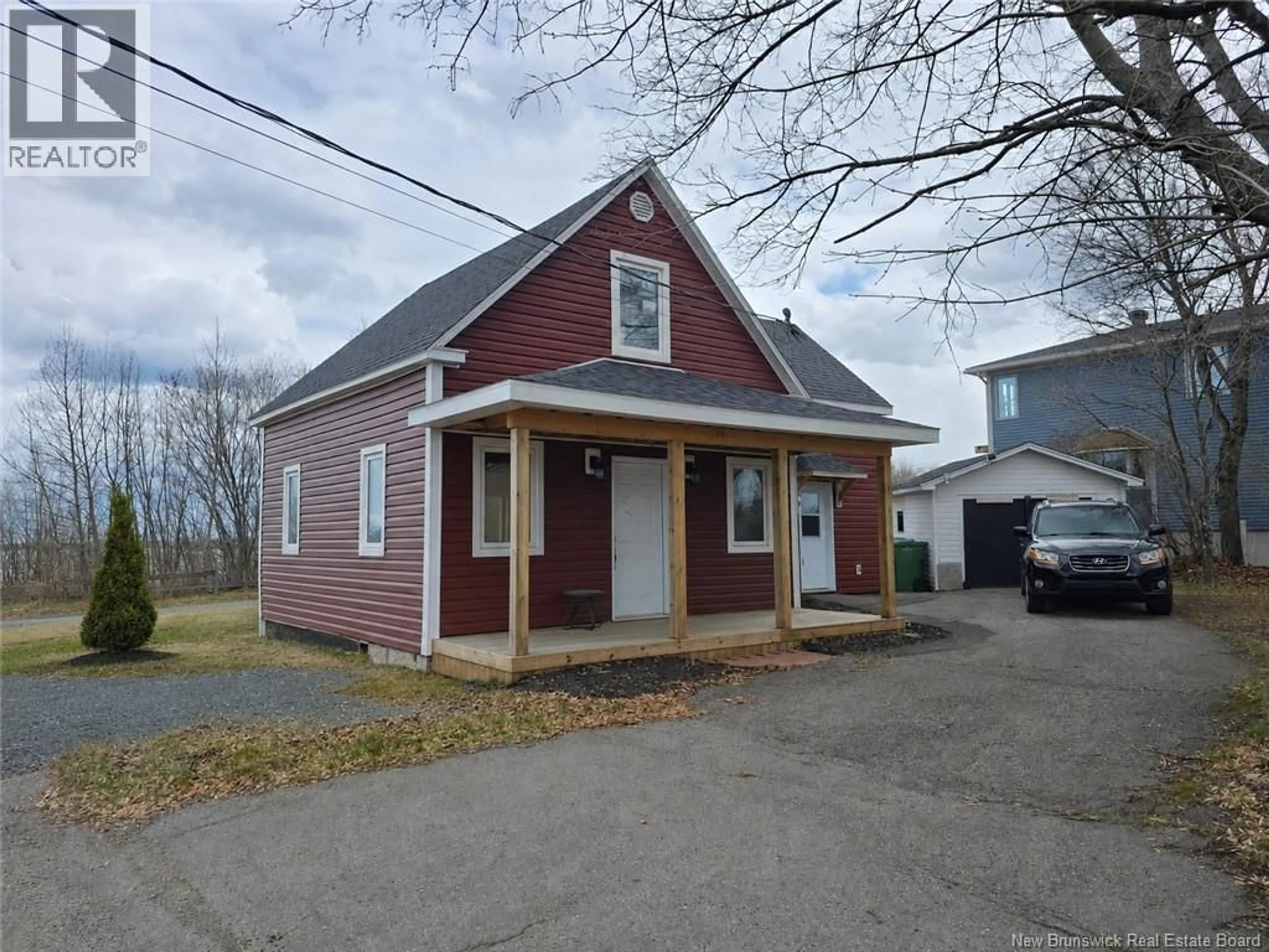 Home with vinyl exterior material, street for 245 PLEASANT, Bathurst New Brunswick E2A3B3