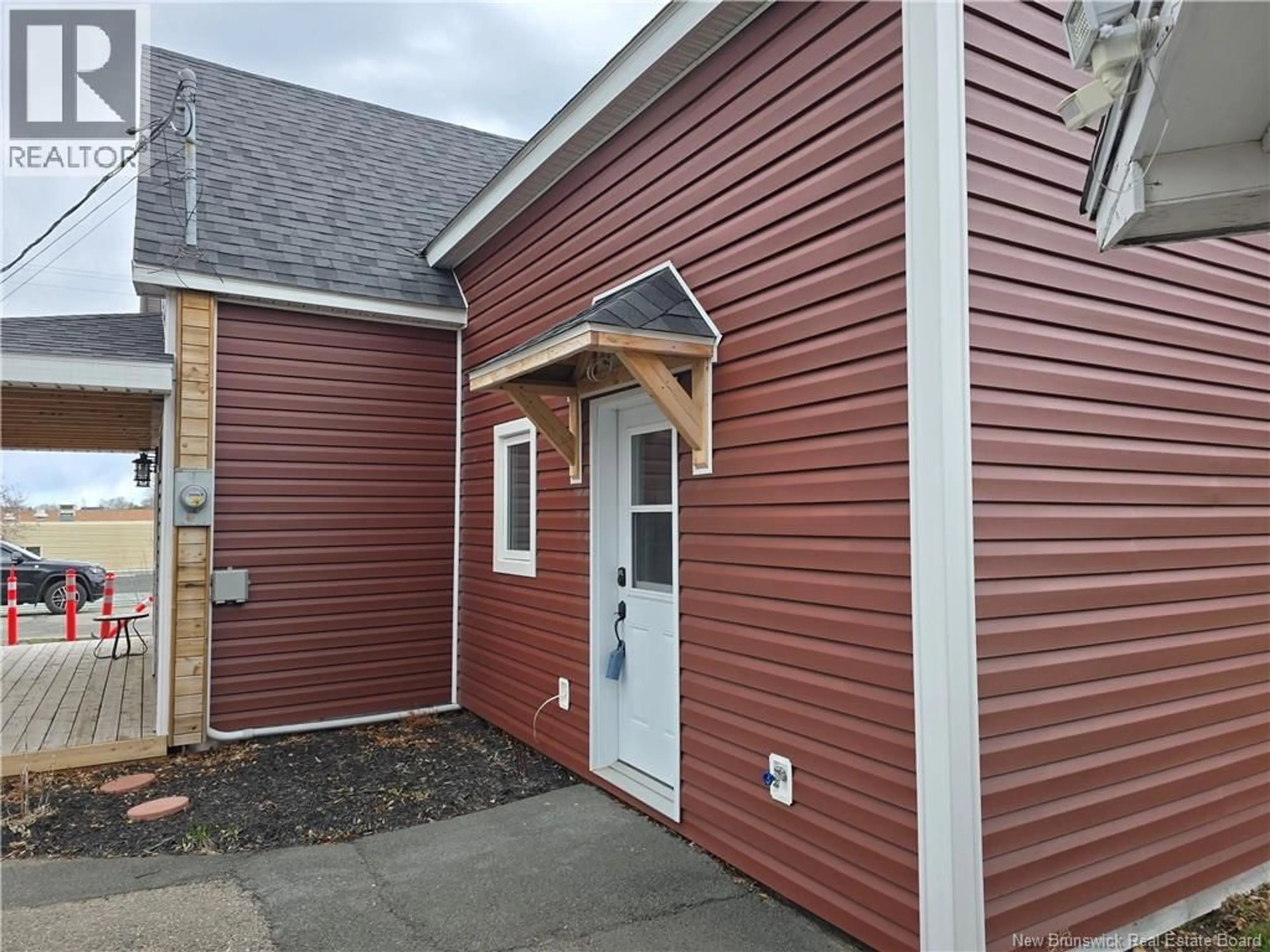 Home with vinyl exterior material, street for 245 PLEASANT, Bathurst New Brunswick E2A3B3