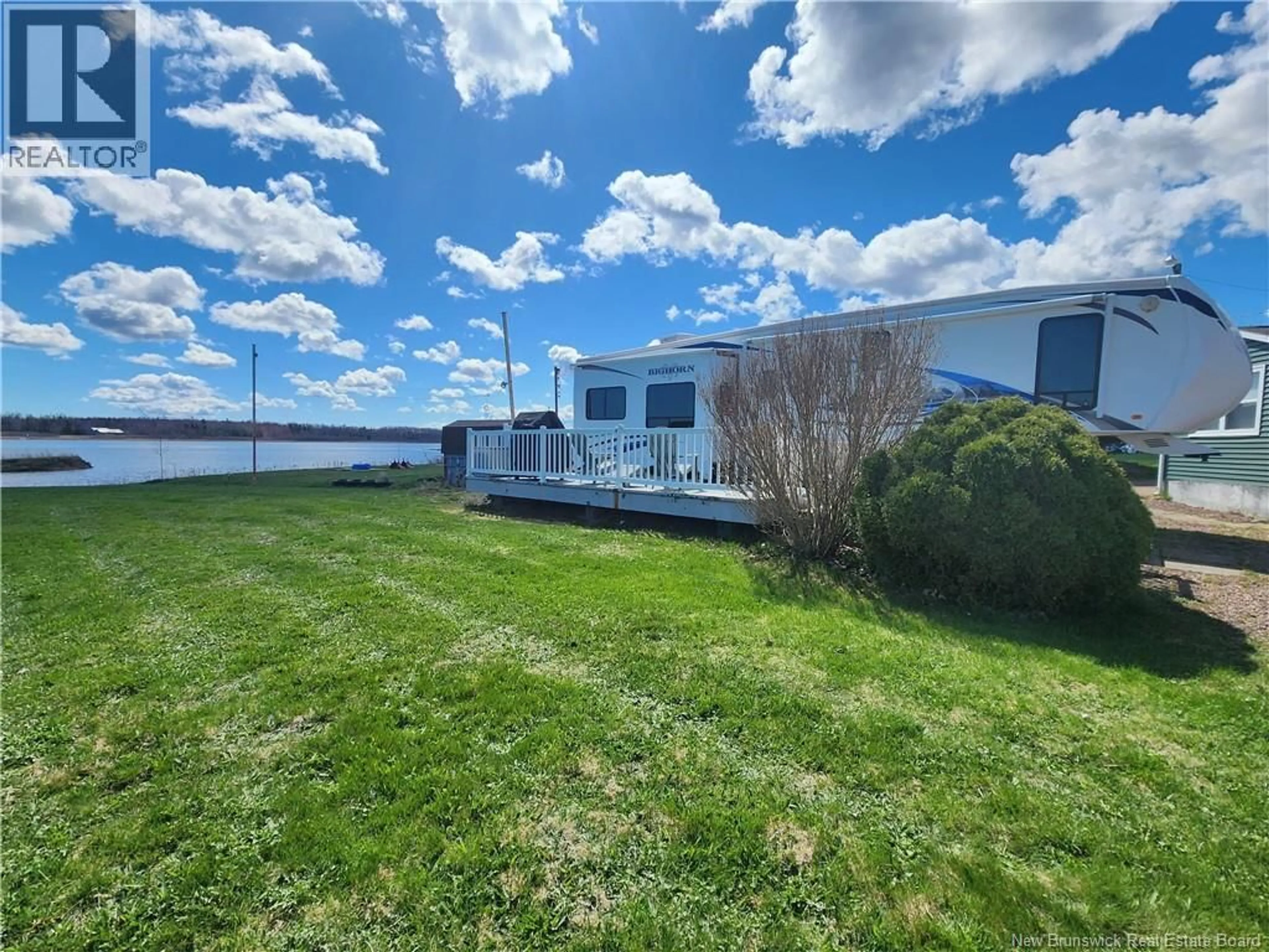 A pic from outside/outdoor area/front of a property/back of a property/a pic from drone, water/lake/river/ocean view for 53 THIBODEAU, Grand-Barachois New Brunswick E4P8P4