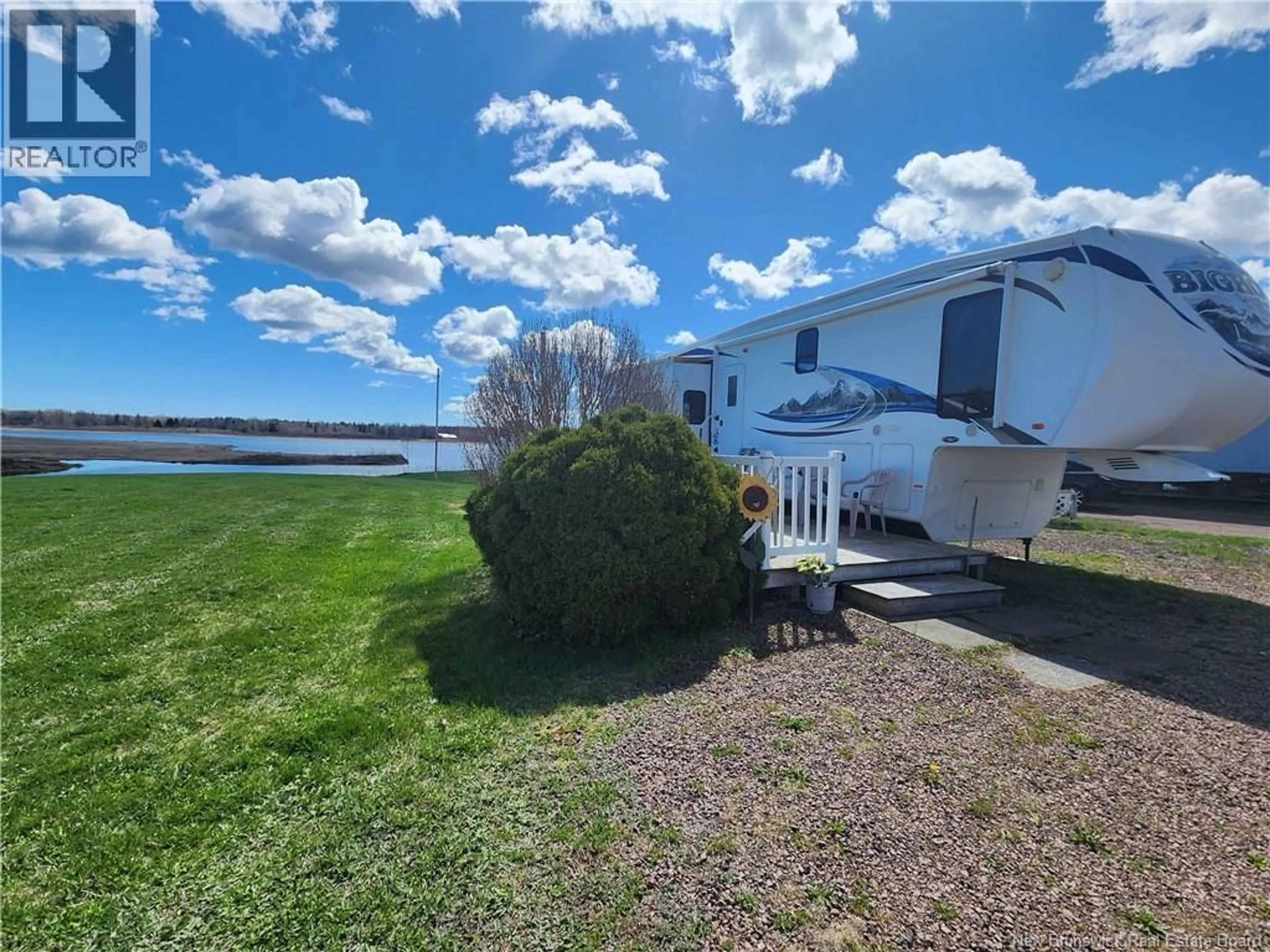 A pic from outside/outdoor area/front of a property/back of a property/a pic from drone, water/lake/river/ocean view for 53 THIBODEAU, Grand-Barachois New Brunswick E4P8P4