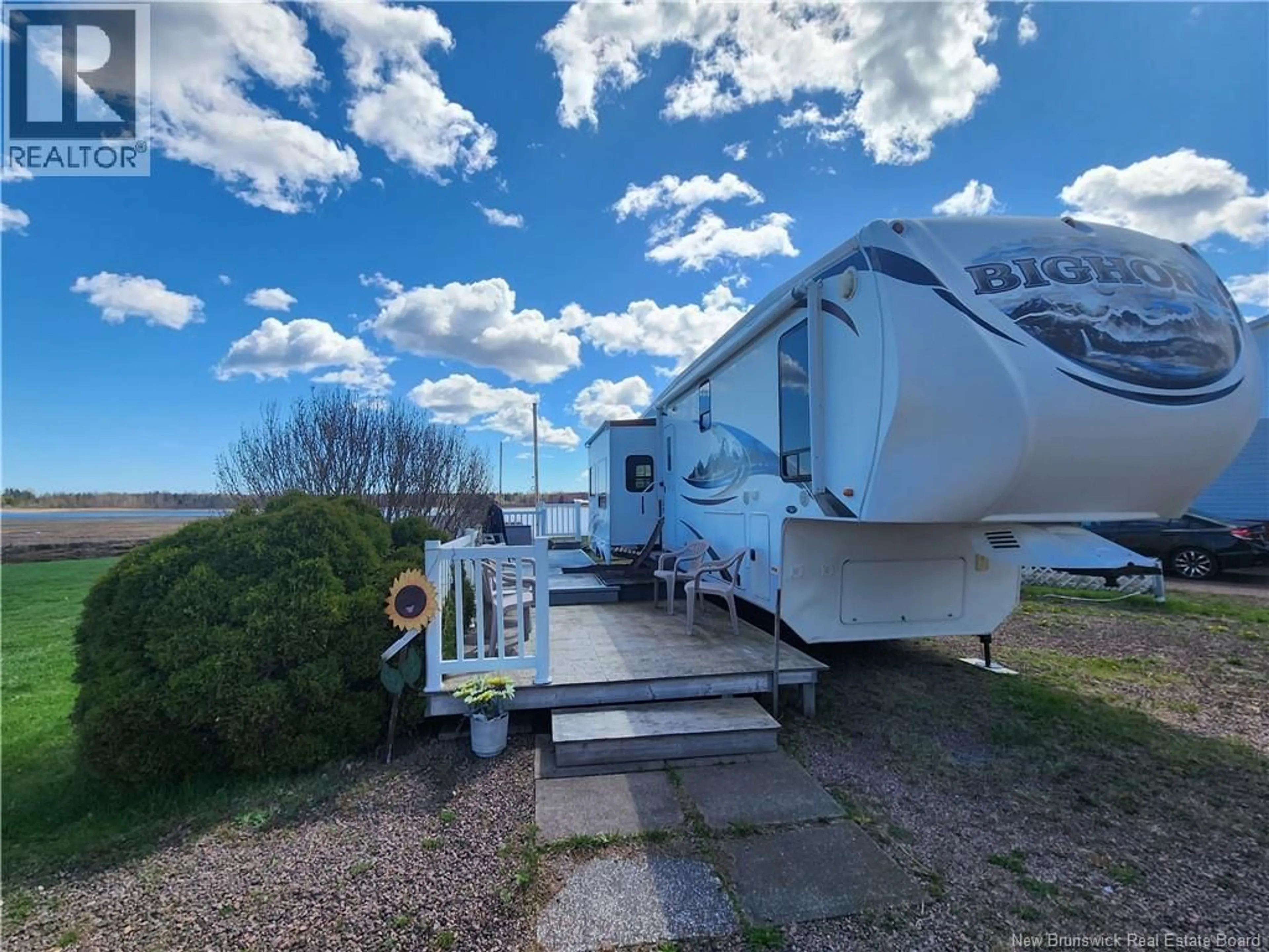 A pic from outside/outdoor area/front of a property/back of a property/a pic from drone, water/lake/river/ocean view for 53 THIBODEAU, Grand-Barachois New Brunswick E4P8P4