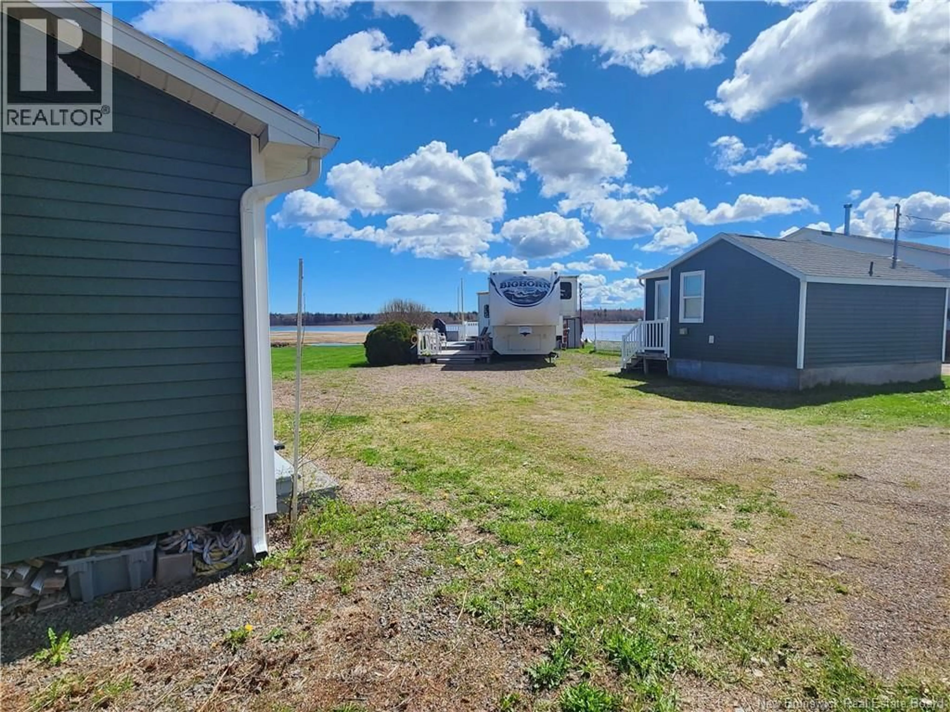 A pic from outside/outdoor area/front of a property/back of a property/a pic from drone, water/lake/river/ocean view for 53 THIBODEAU, Grand-Barachois New Brunswick E4P8P4
