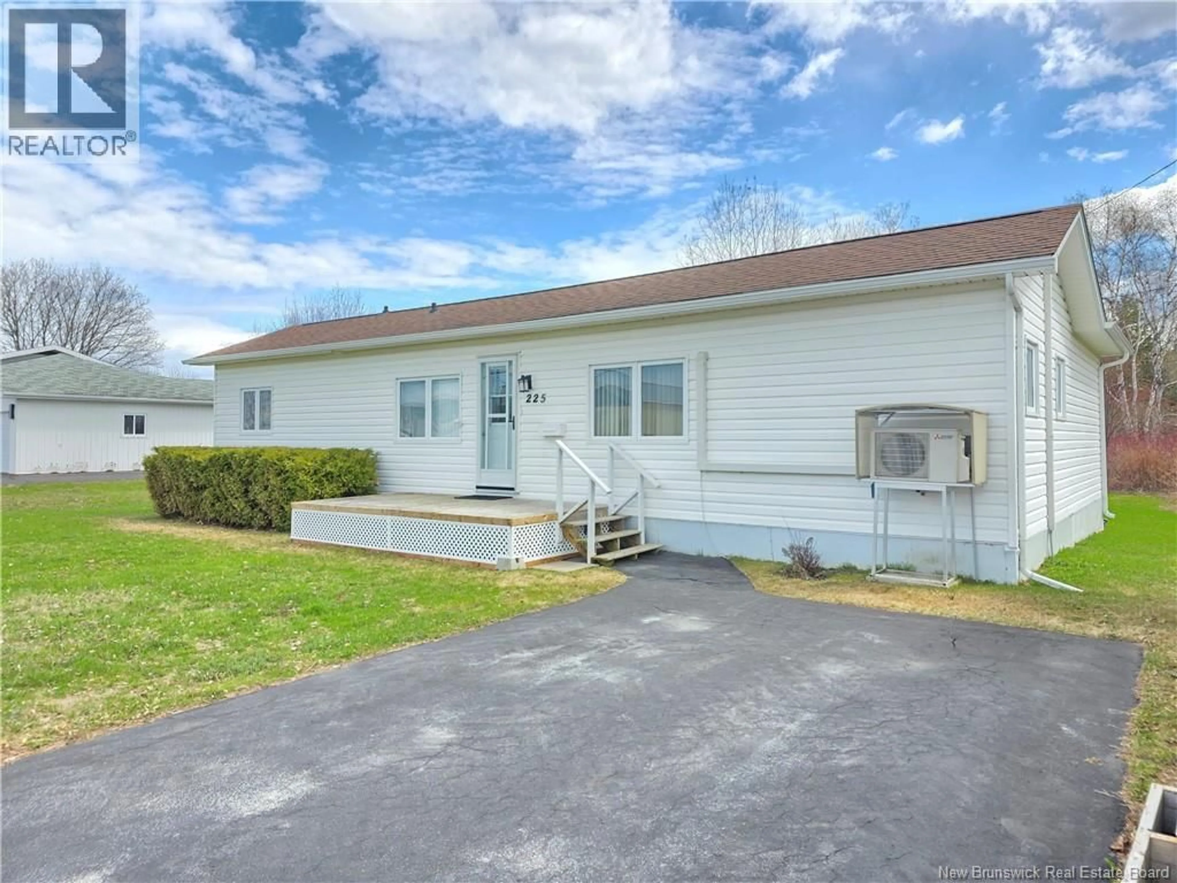 Home with vinyl exterior material, unknown for 225 PARC, Beresford New Brunswick E8K1V9