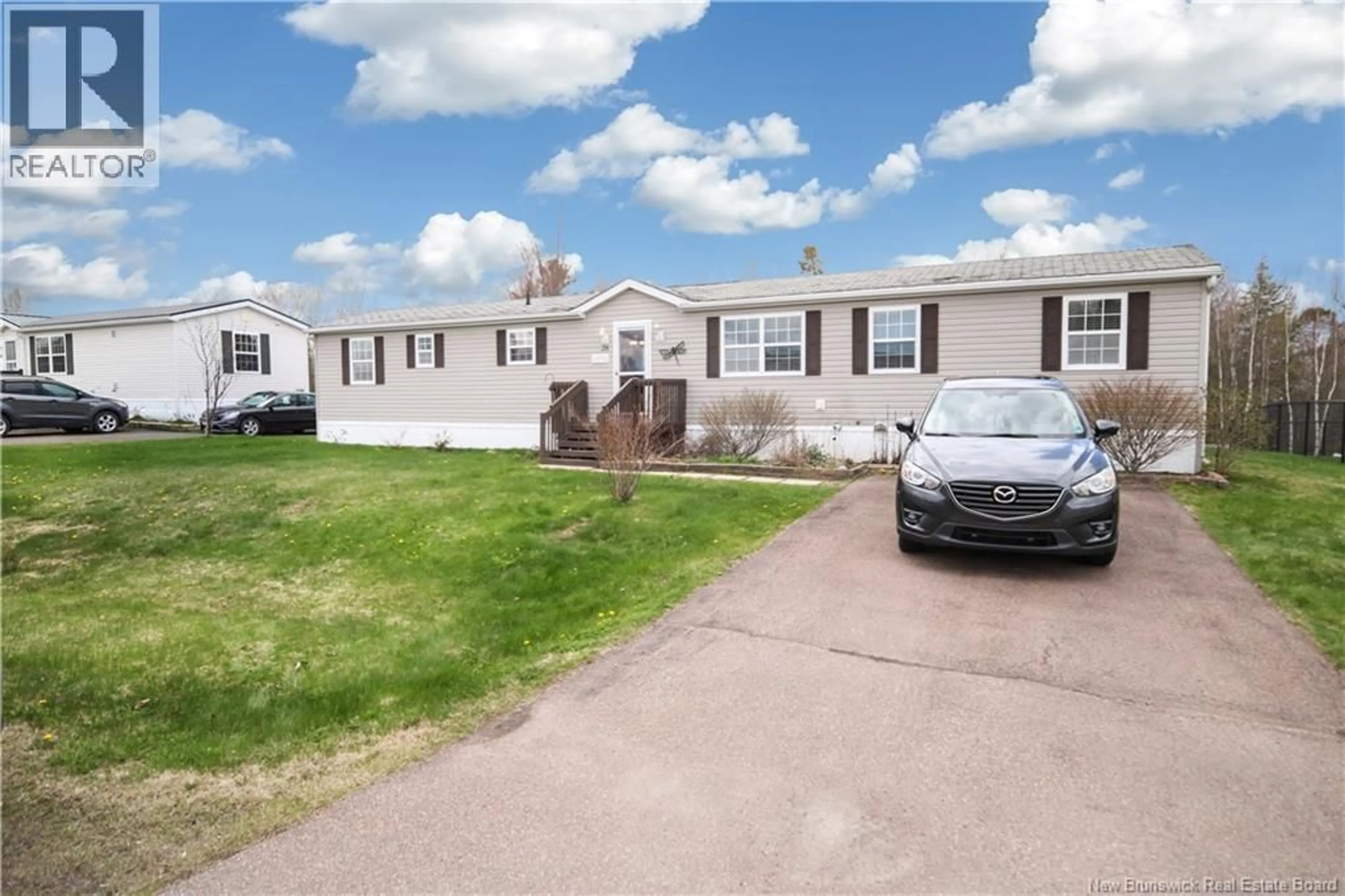 Home with vinyl exterior material, street for 26 CONVERSE LANE, Riverview New Brunswick E1B5J4
