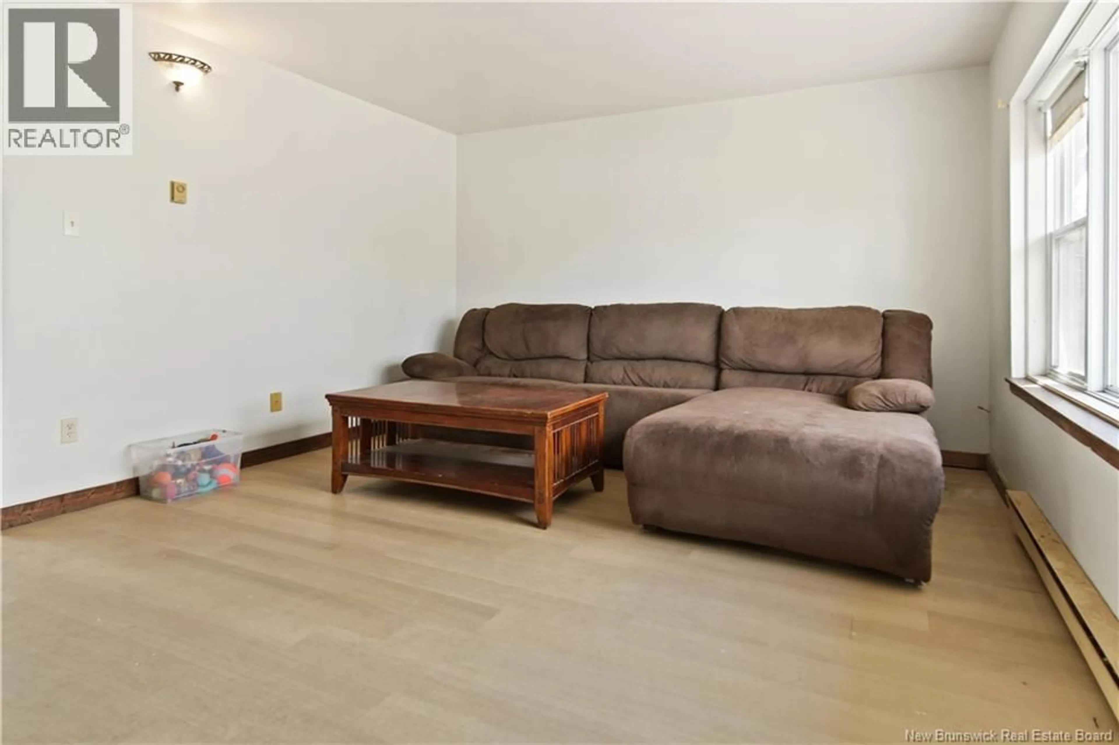 Living room with furniture, wood/laminate floor for 4 - 50 TRITES ROAD, Riverview New Brunswick E1B2V7