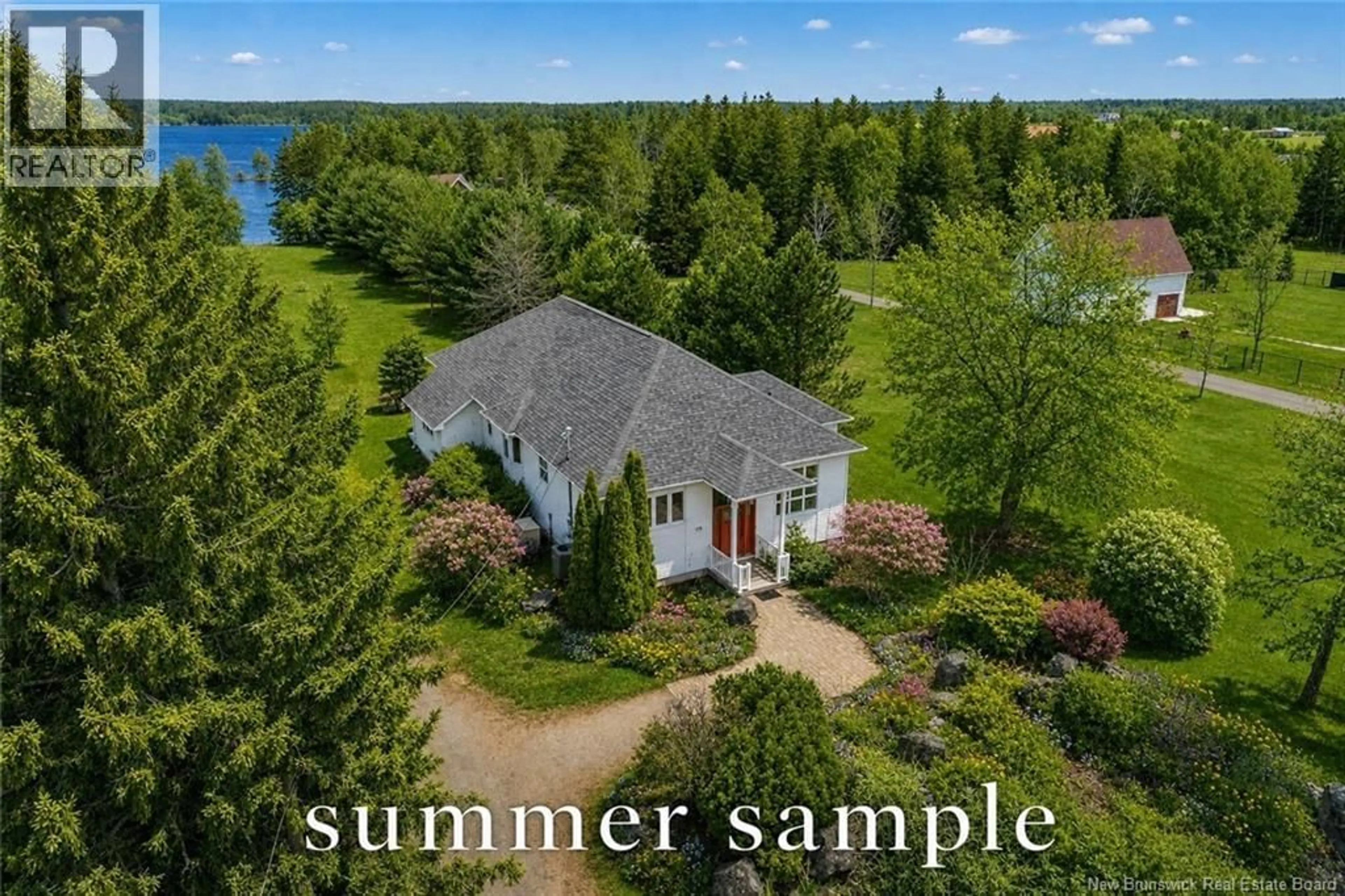 A pic from outside/outdoor area/front of a property/back of a property/a pic from drone, water/lake/river/ocean view for 114 DU COUVENT, Bouctouche New Brunswick E4S3C1
