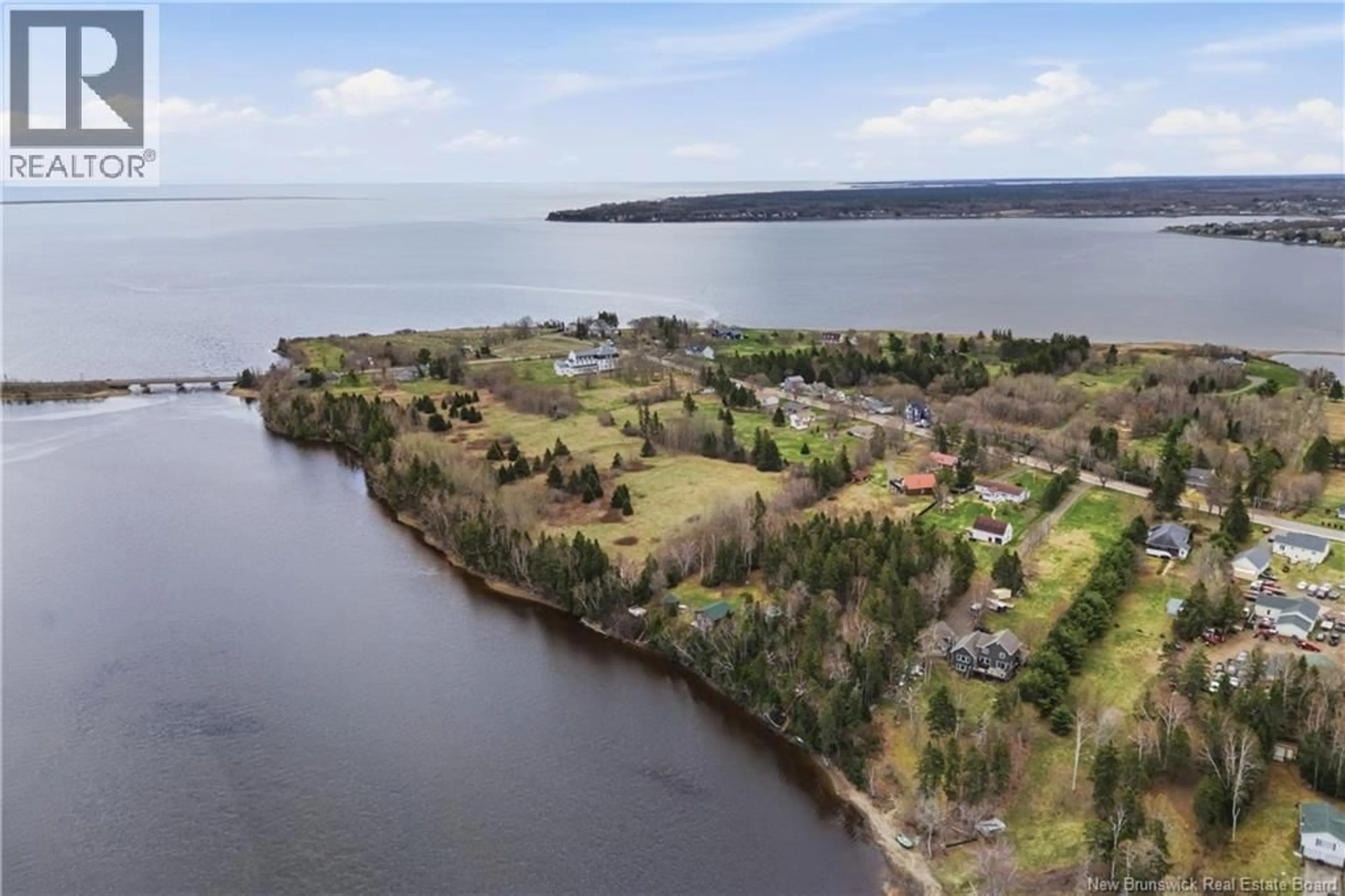 A pic from outside/outdoor area/front of a property/back of a property/a pic from drone, water/lake/river/ocean view for 114 DU COUVENT, Bouctouche New Brunswick E4S3C1