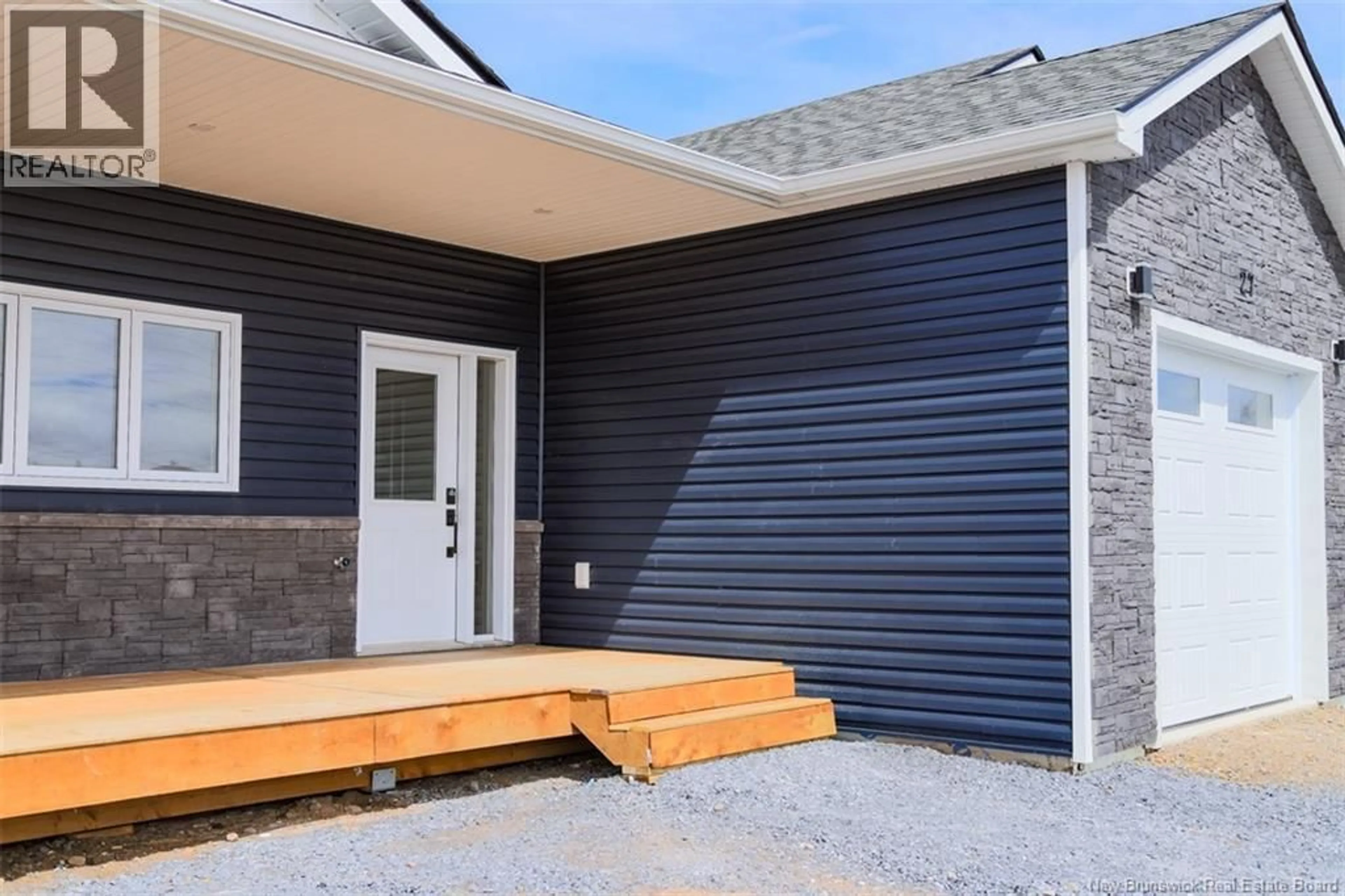 Home with vinyl exterior material, street for 27 WHITE PINE COURT, Hampton New Brunswick E5N0P3