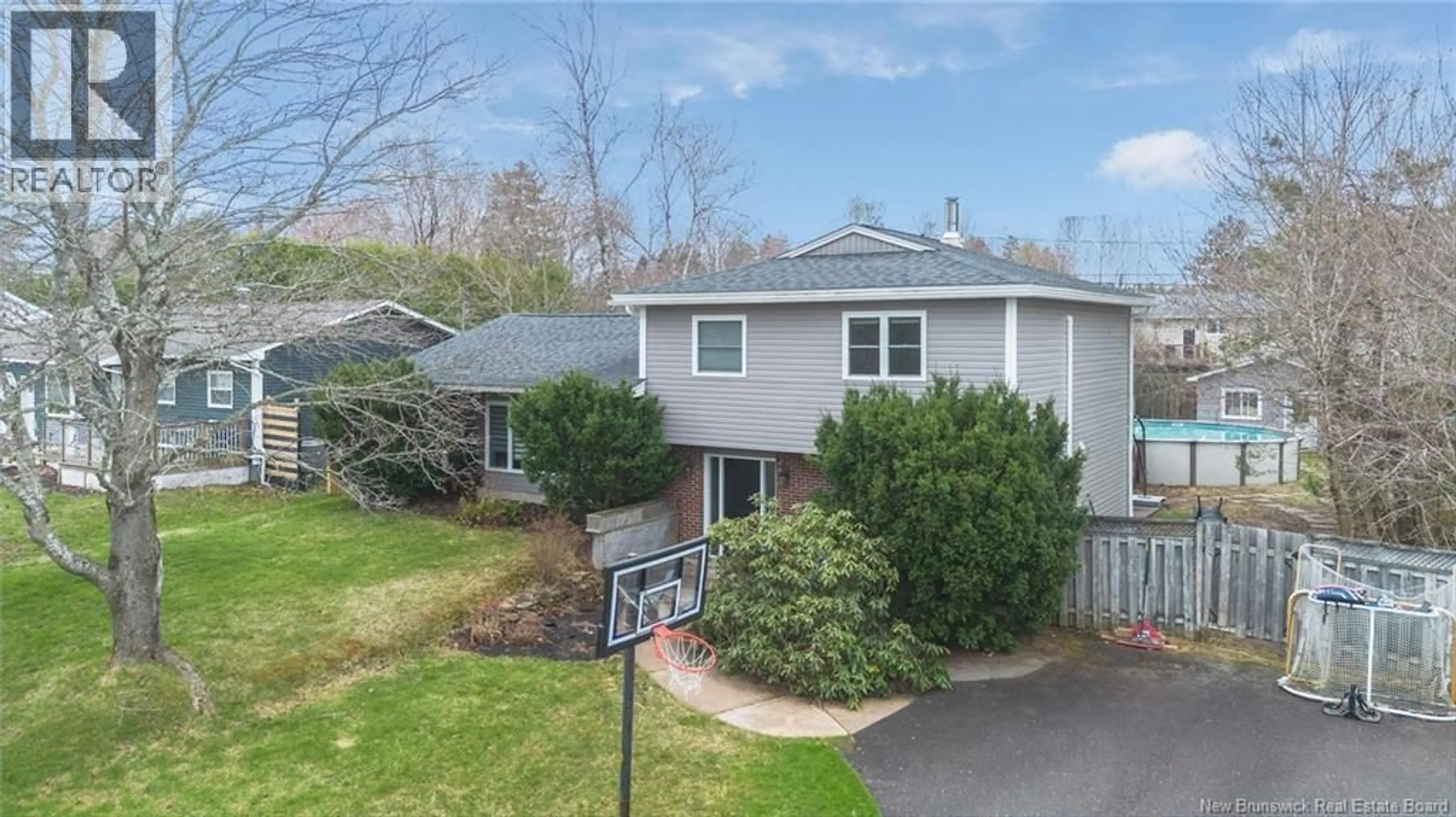 A pic from outside/outdoor area/front of a property/back of a property/a pic from drone, street for 31 PINERIDGE AVENUE, New Maryland New Brunswick E3C1C6