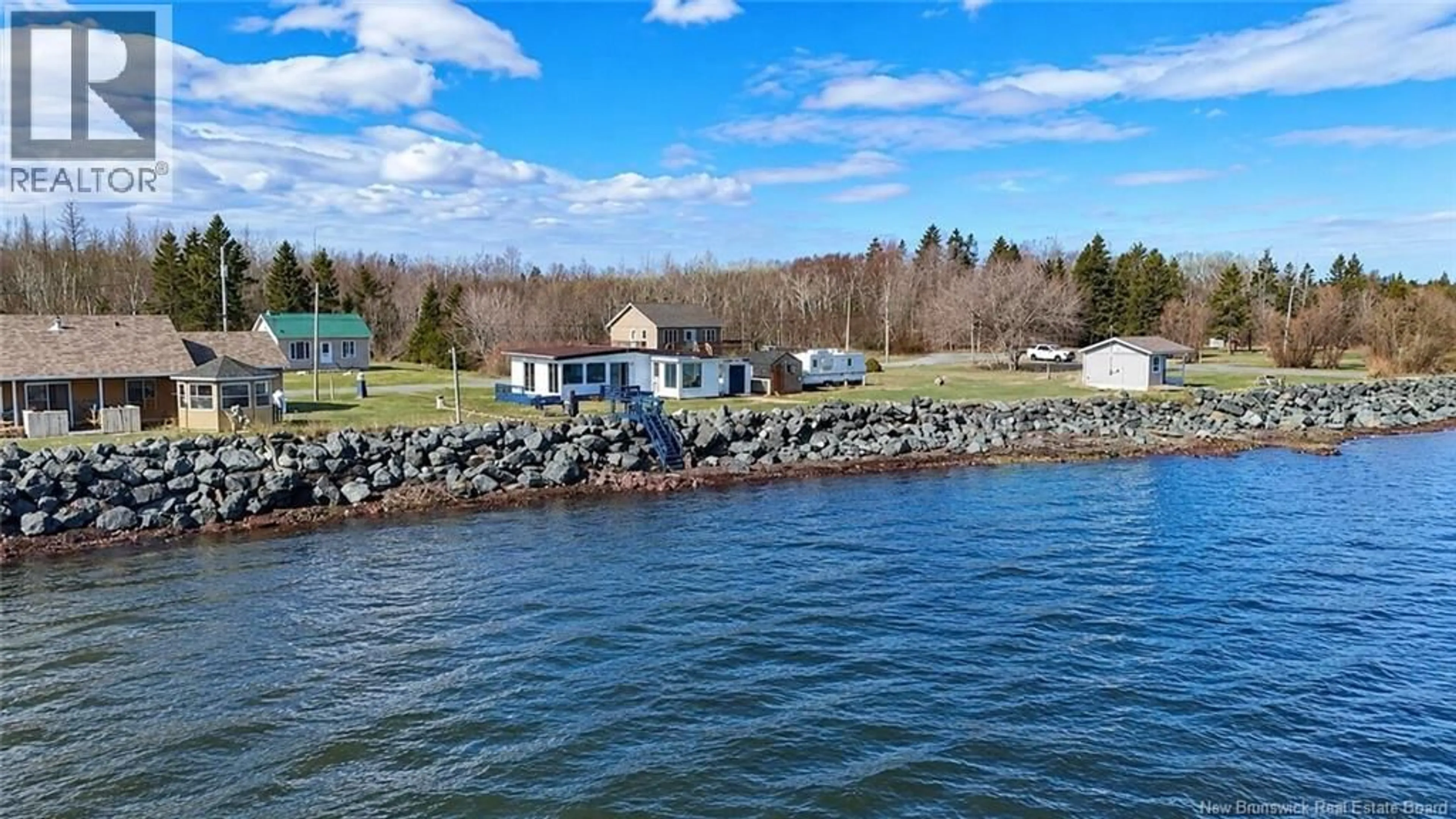 A pic from outside/outdoor area/front of a property/back of a property/a pic from drone, water/lake/river/ocean view for 9 DE L'ANSE EST, Pointe-Verte New Brunswick E8J3A7