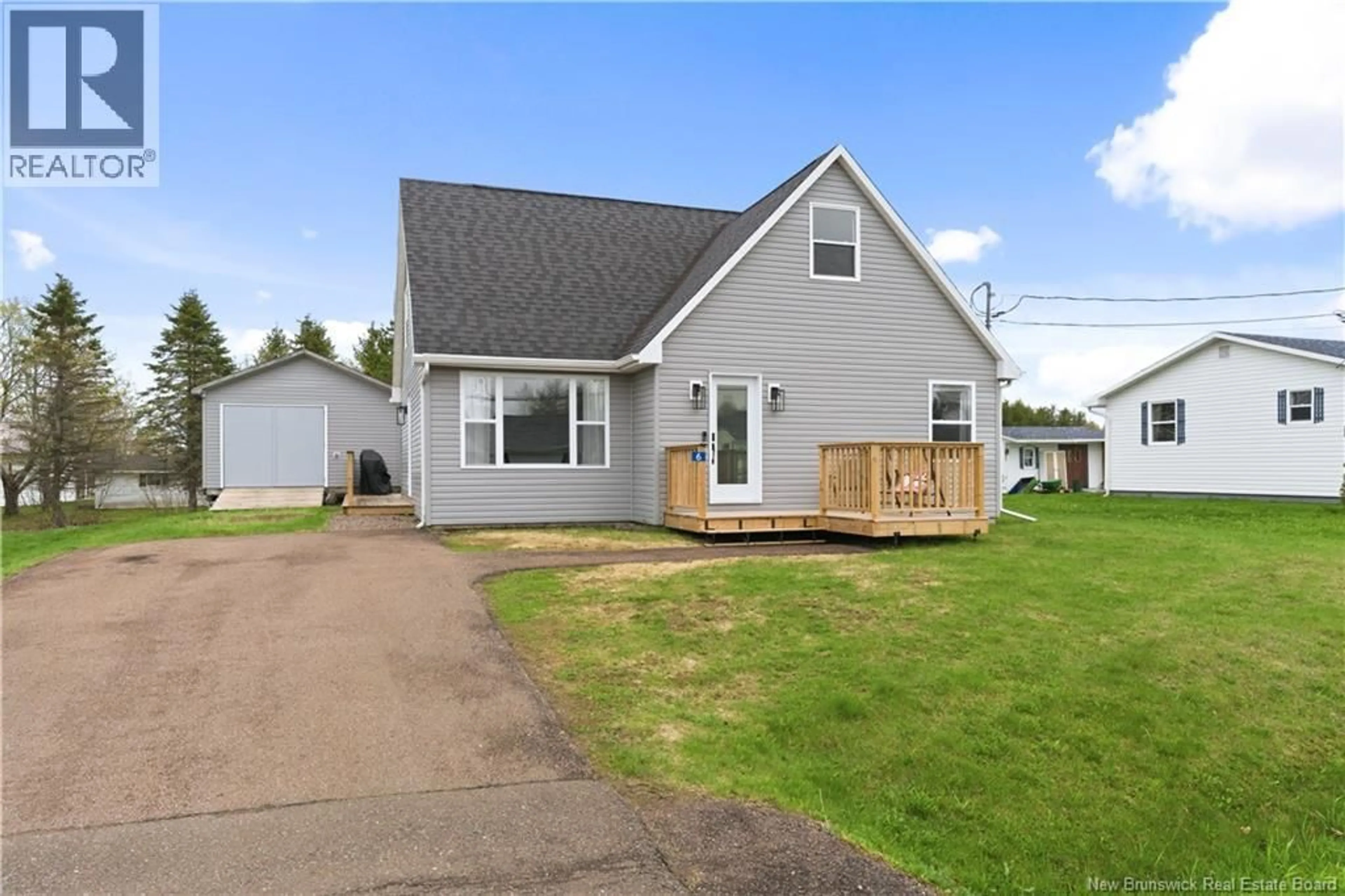 Home with vinyl exterior material, street for 6 PARKER RD, Scoudouc New Brunswick E4P3P9