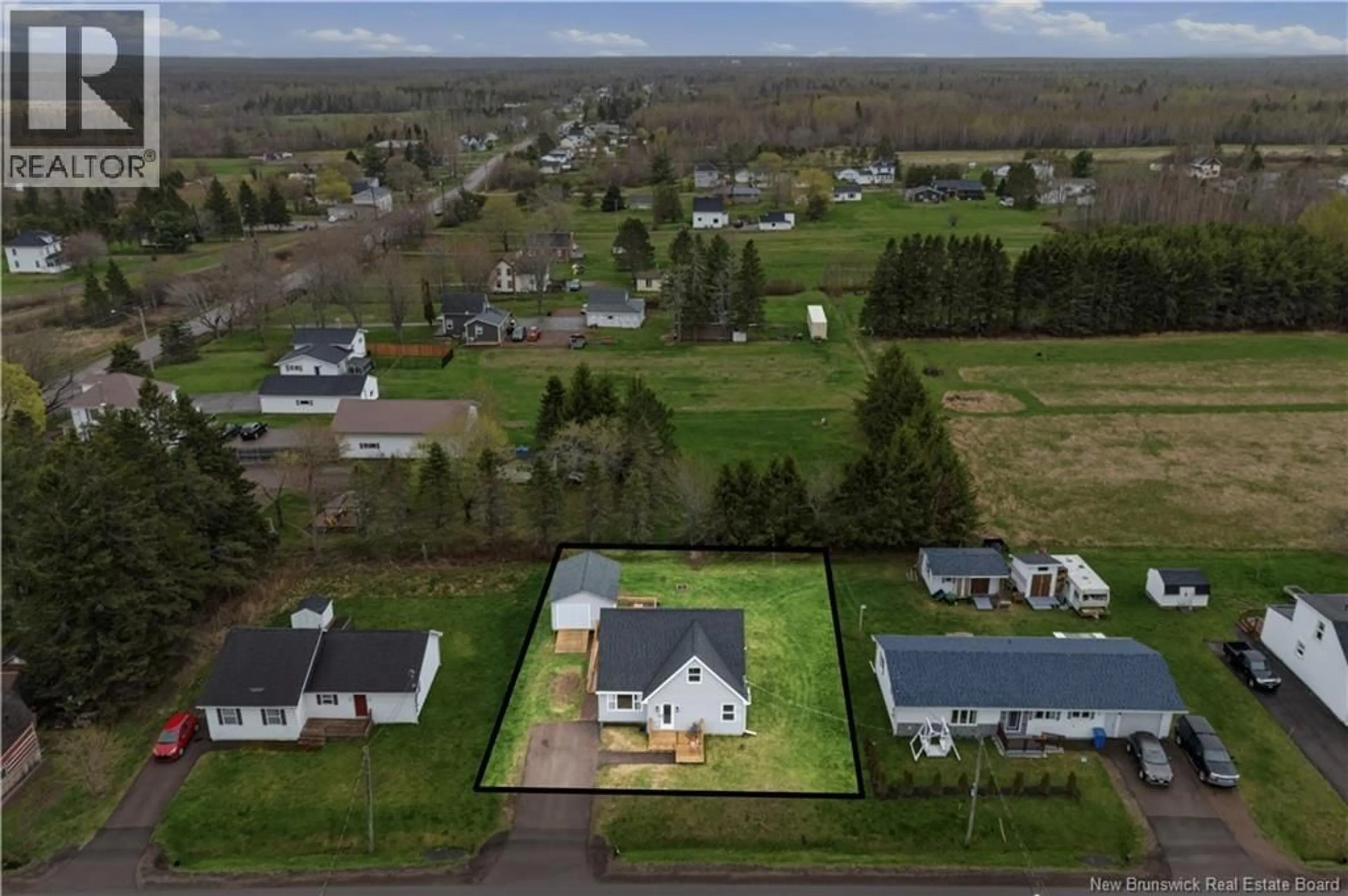 A pic from outside/outdoor area/front of a property/back of a property/a pic from drone, street for 6 PARKER RD, Scoudouc New Brunswick E4P3P9