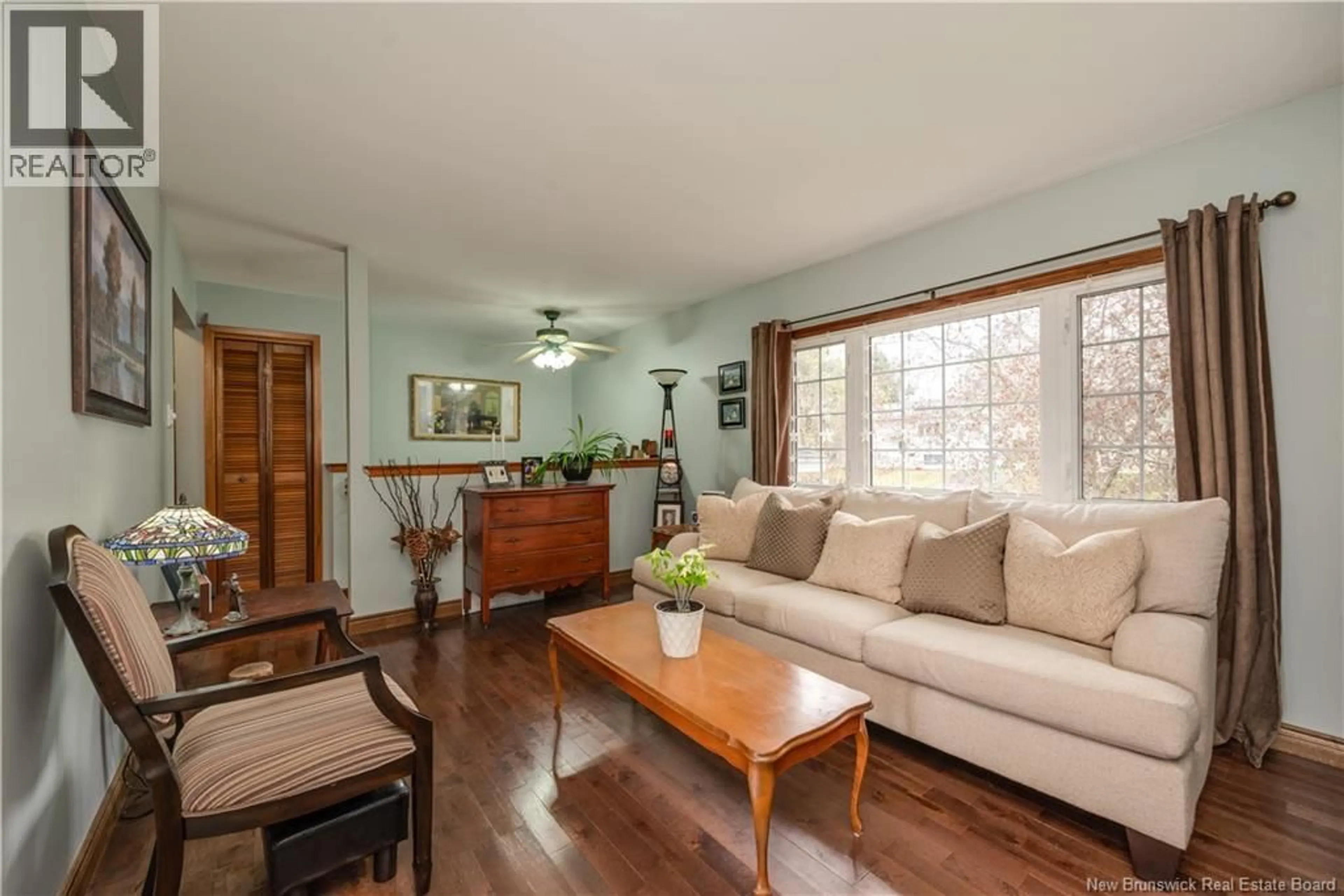 Living room with furniture, wood/laminate floor for 38 MEGHAN STREET, Riverview New Brunswick E1B4E5