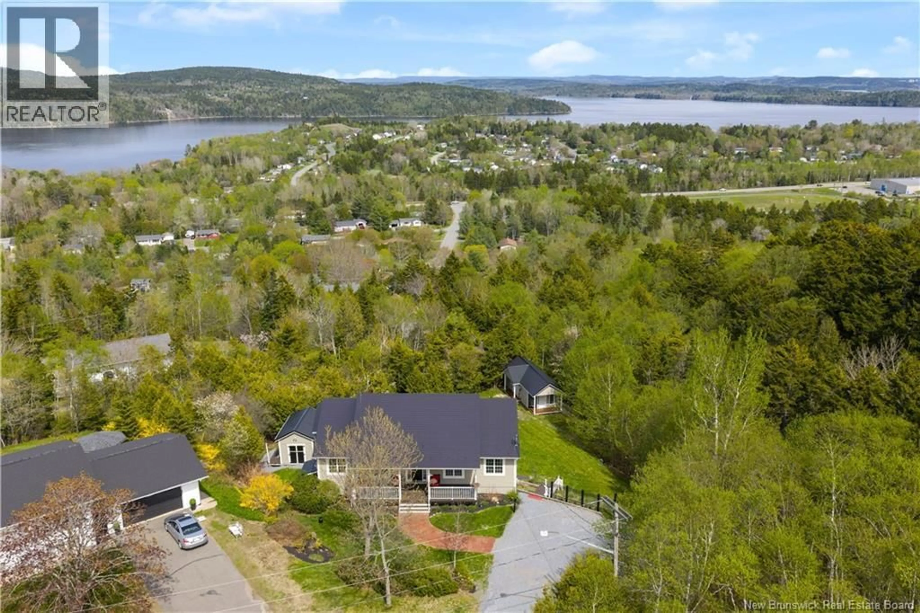 A pic from outside/outdoor area/front of a property/back of a property/a pic from drone, water/lake/river/ocean view for 69 MORNINGSIDE CRESCENT, Grand Bay-Westfield New Brunswick E5K1X9