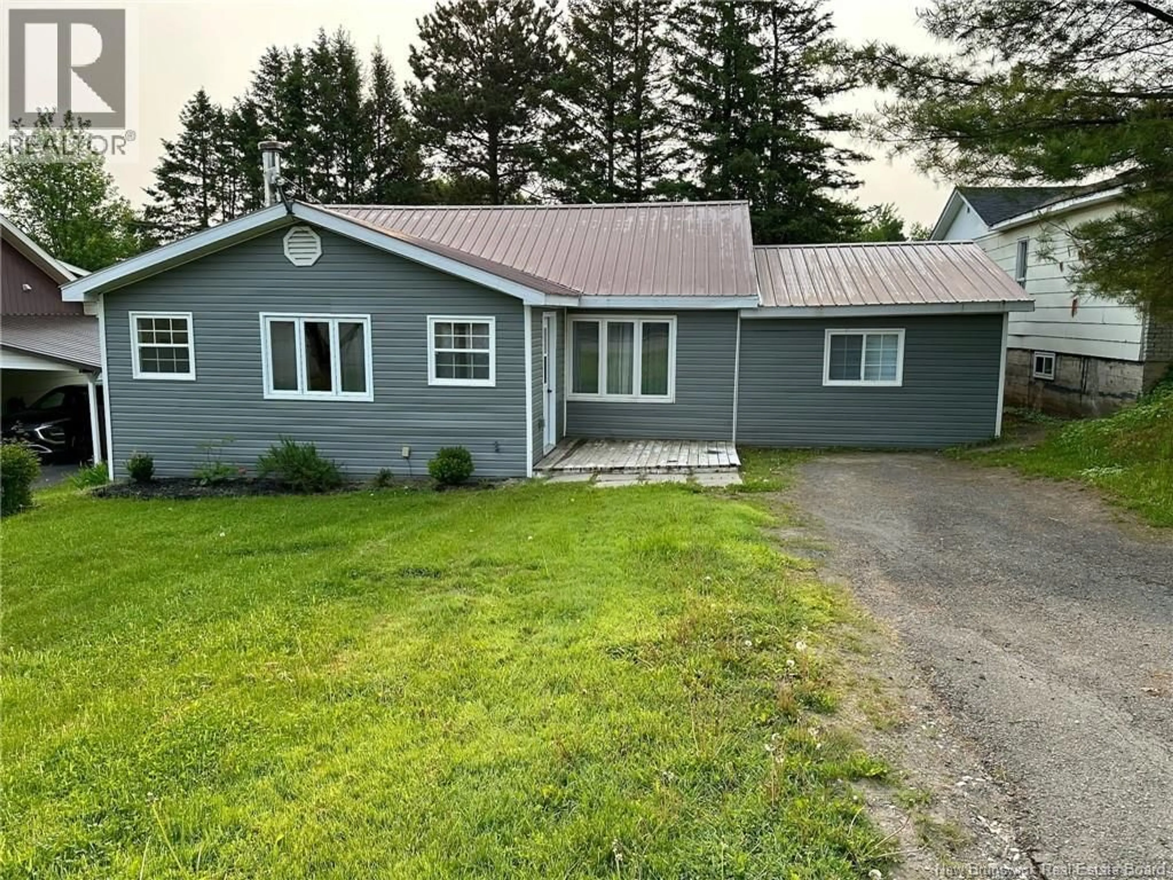 Home with vinyl exterior material, street for 142 MAIN STREET, Plaster Rock New Brunswick E7G2E4
