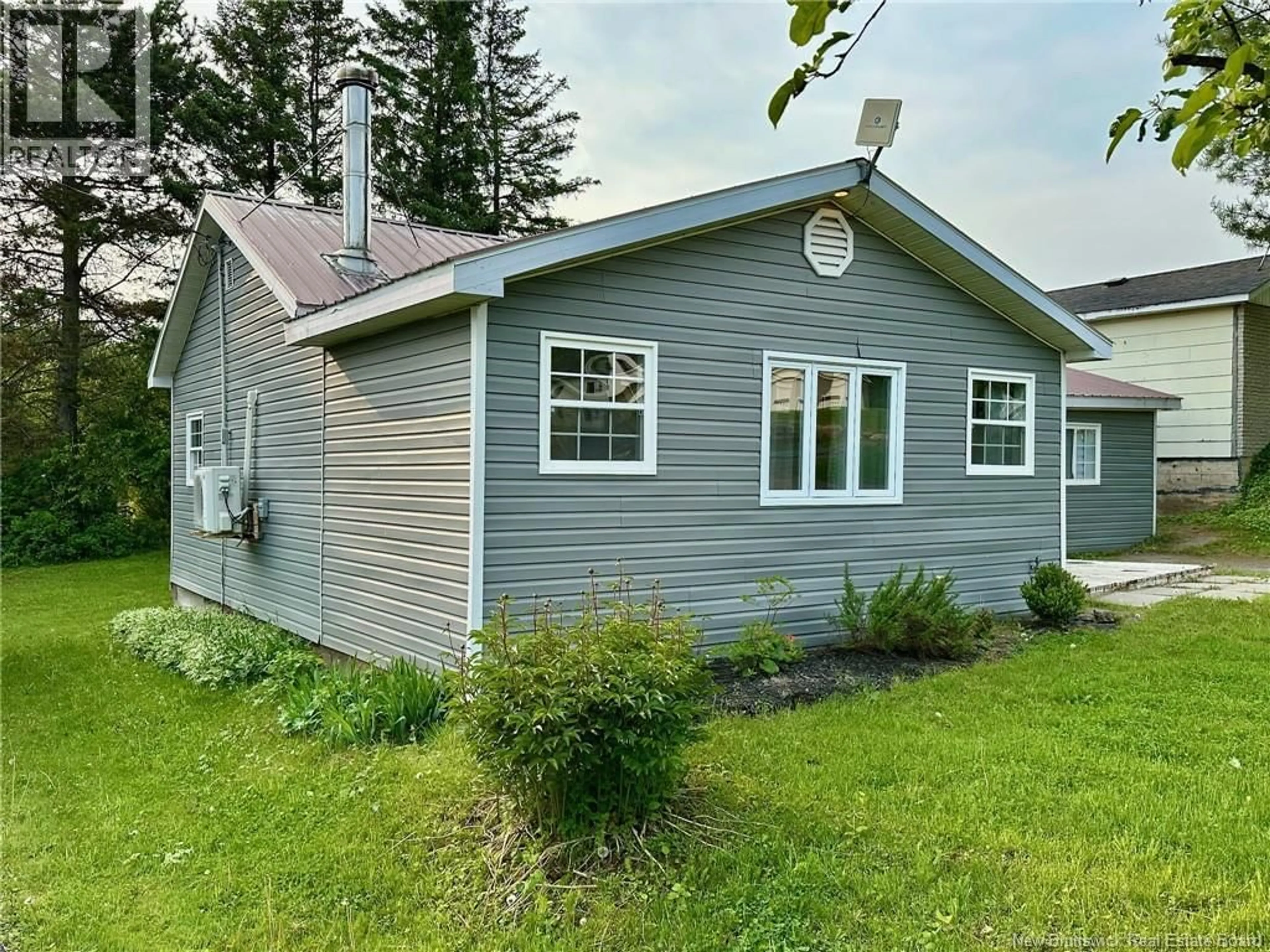 Home with vinyl exterior material, unknown for 142 MAIN STREET, Plaster Rock New Brunswick E7G2E4